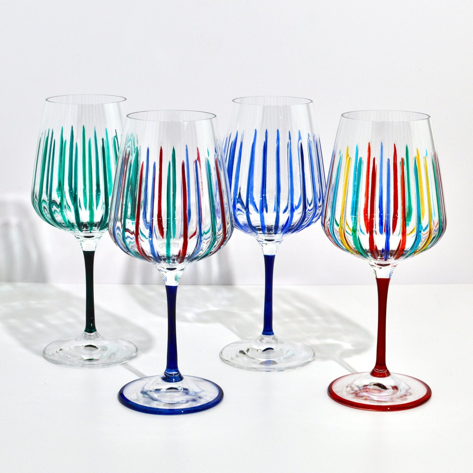 Set of 2 blue Spritz crystal wine glasses by My Italian Decor, elegant Italian-made wine glass set with colorful designs.