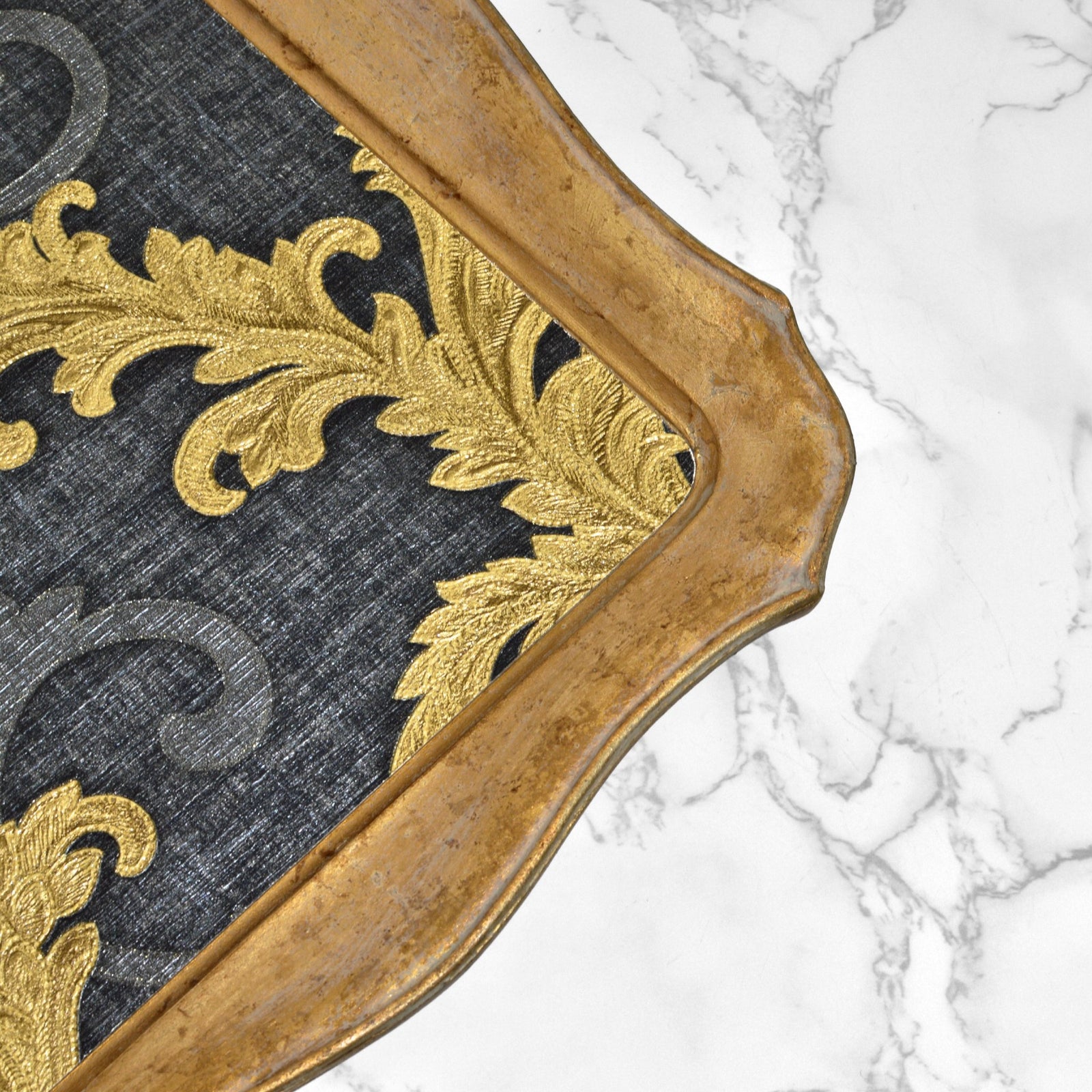 Decorative Florentine carved Versace fabric tray on wood, made in Italy, with intricate patterns and luxurious design.