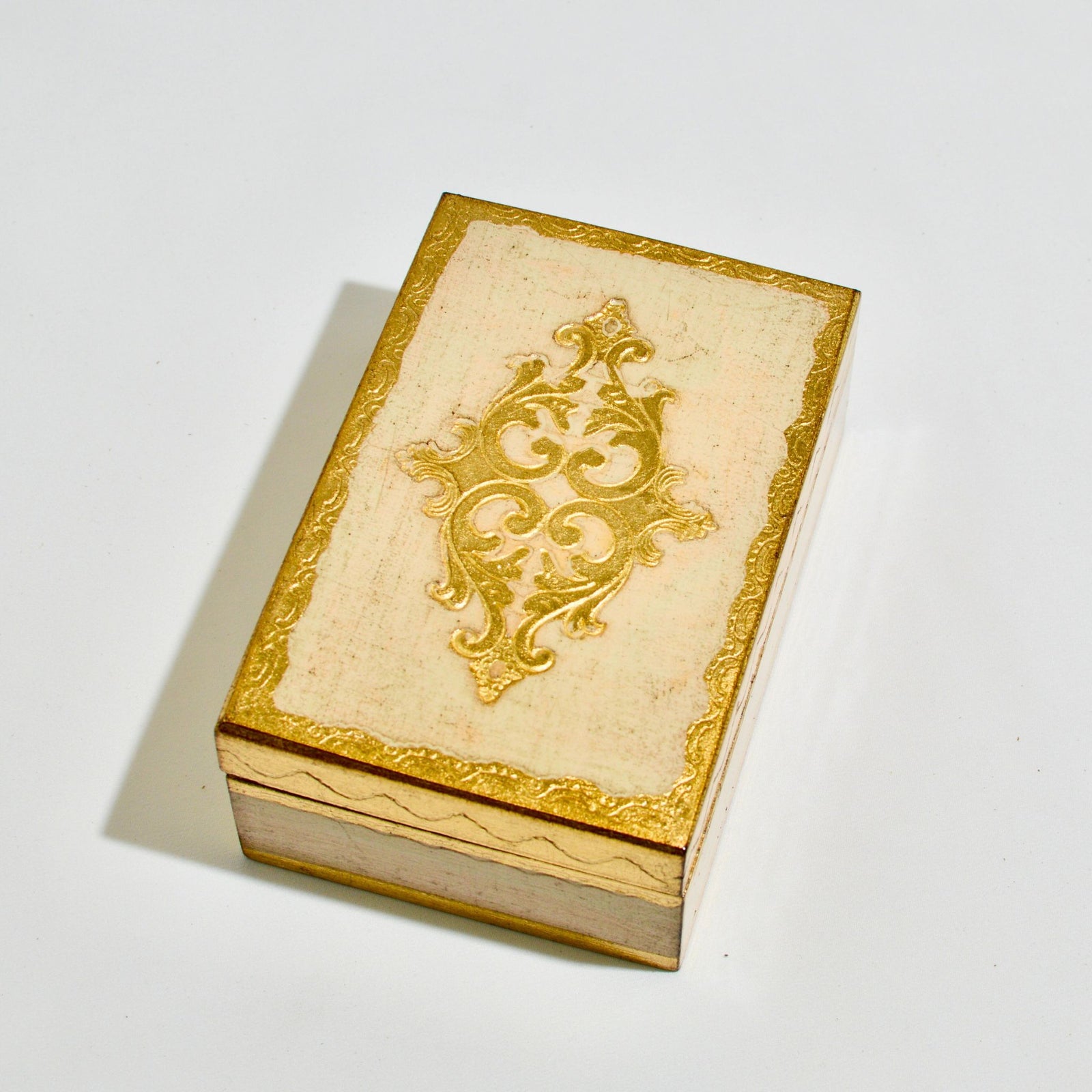 Stacked Florentine carved wood jewelry boxes by My Italian Decor, 4x6 inches with intricate decorative designs.