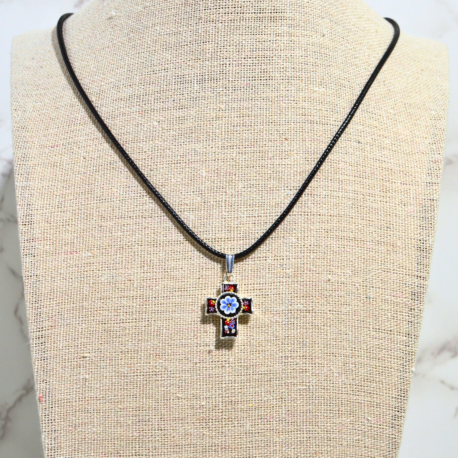 Mini Florentine mosaic cross pendant necklace by MyItalianDecor, featuring colorful Italian craftsmanship around the neck.