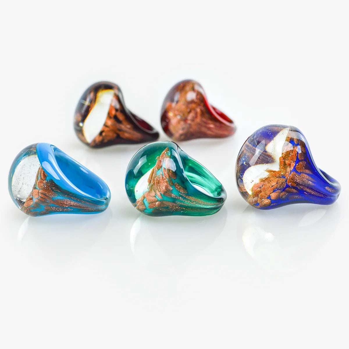Murano glass ring with aventurina beads, crafted in Italy, featuring vibrant green and gold accents on a smooth band.