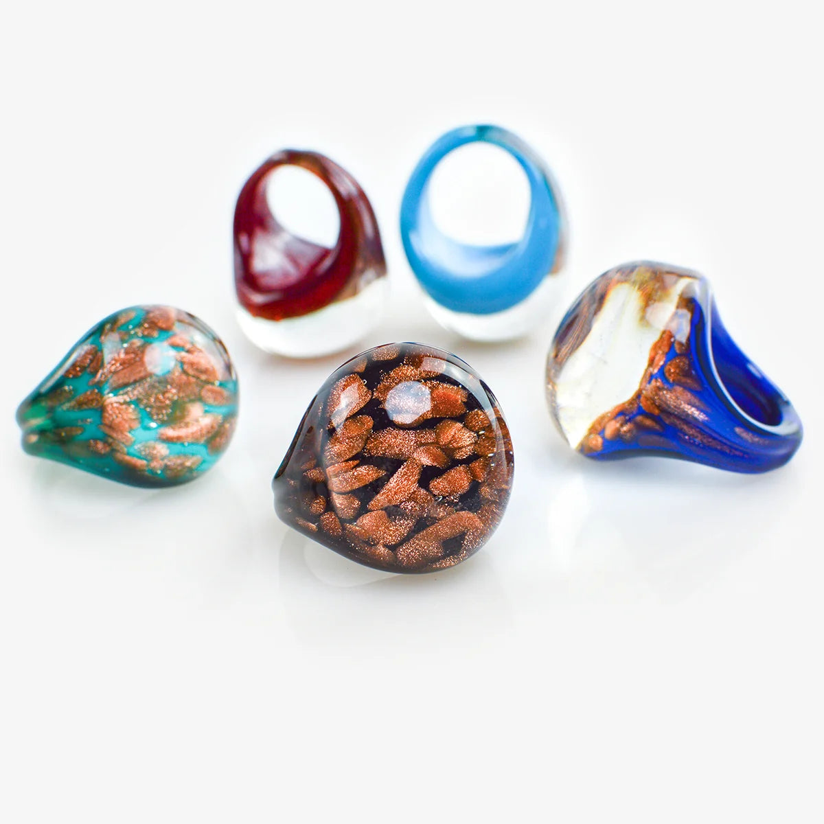 Colorful Murano glass ring featuring aventurina beads, crafted in Italy by My Italian Decor, displayed on a neutral background.