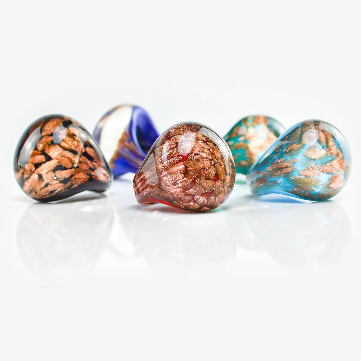 Murano glass ring with aventurina accents, crafted in Italy, featuring a bold statement design and vibrant blue-green hues.