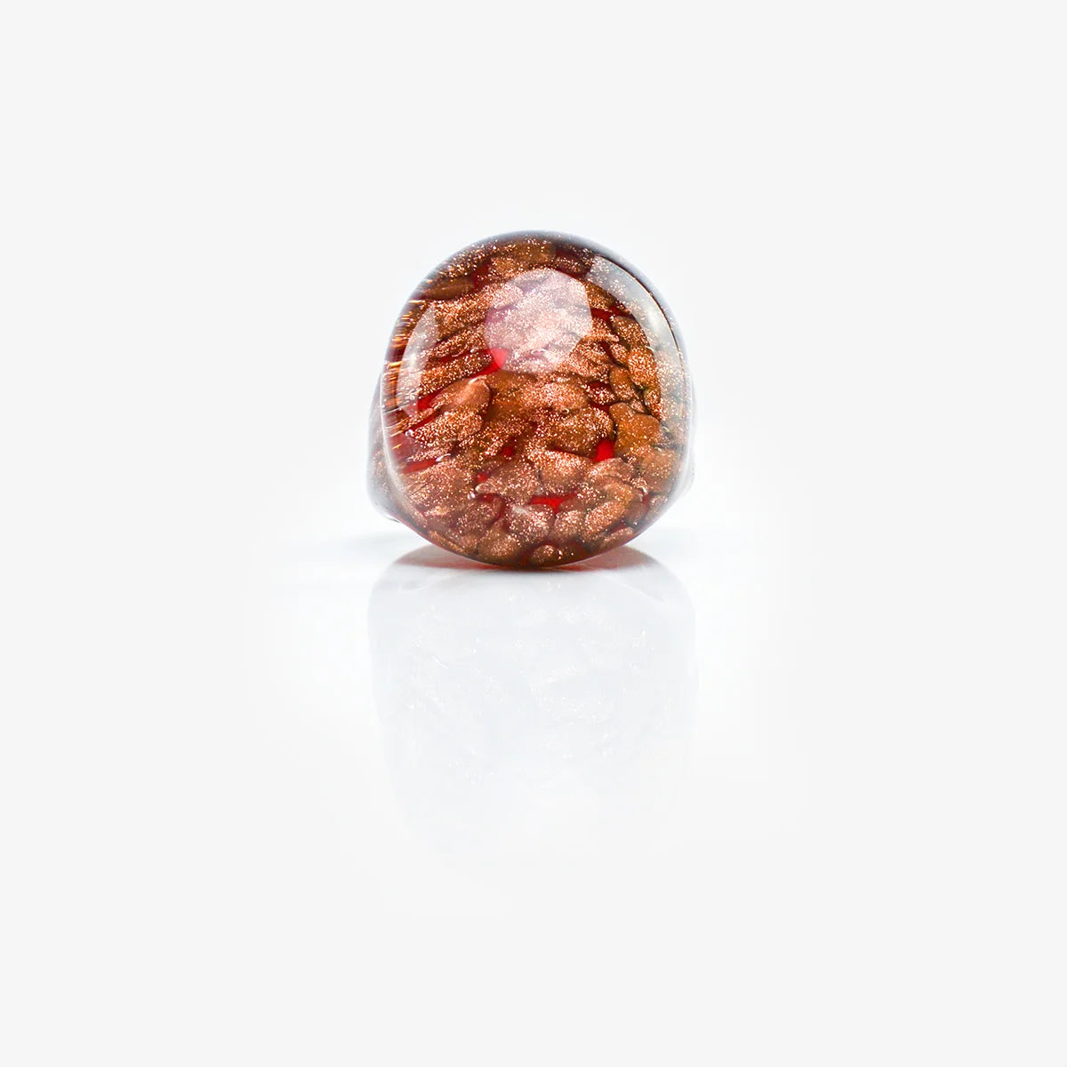 Red Murano glass ring with aventurina accents, crafted in Italy, featuring a smooth, rounded design and intricate glasswork.