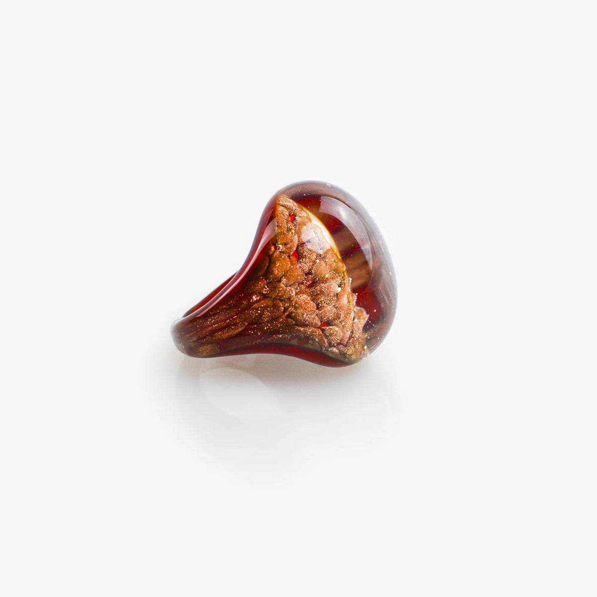 Red Murano glass ring with aventurina accents, crafted by My Italian Decor, showcasing vibrant color and intricate glasswork.