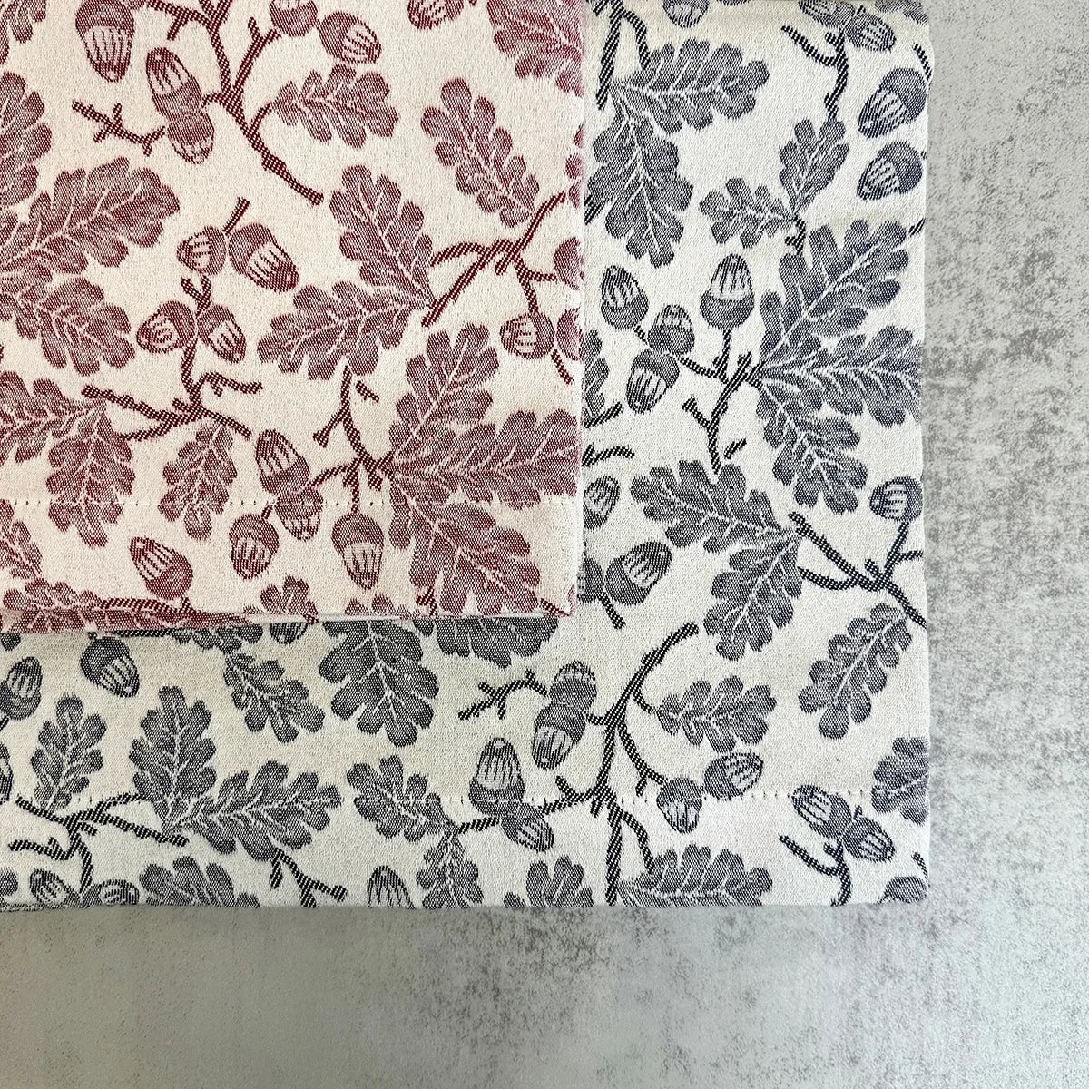 Busatti Acorn table runner made in Italy, featuring intricate woven design, perfect for elegant table linens.