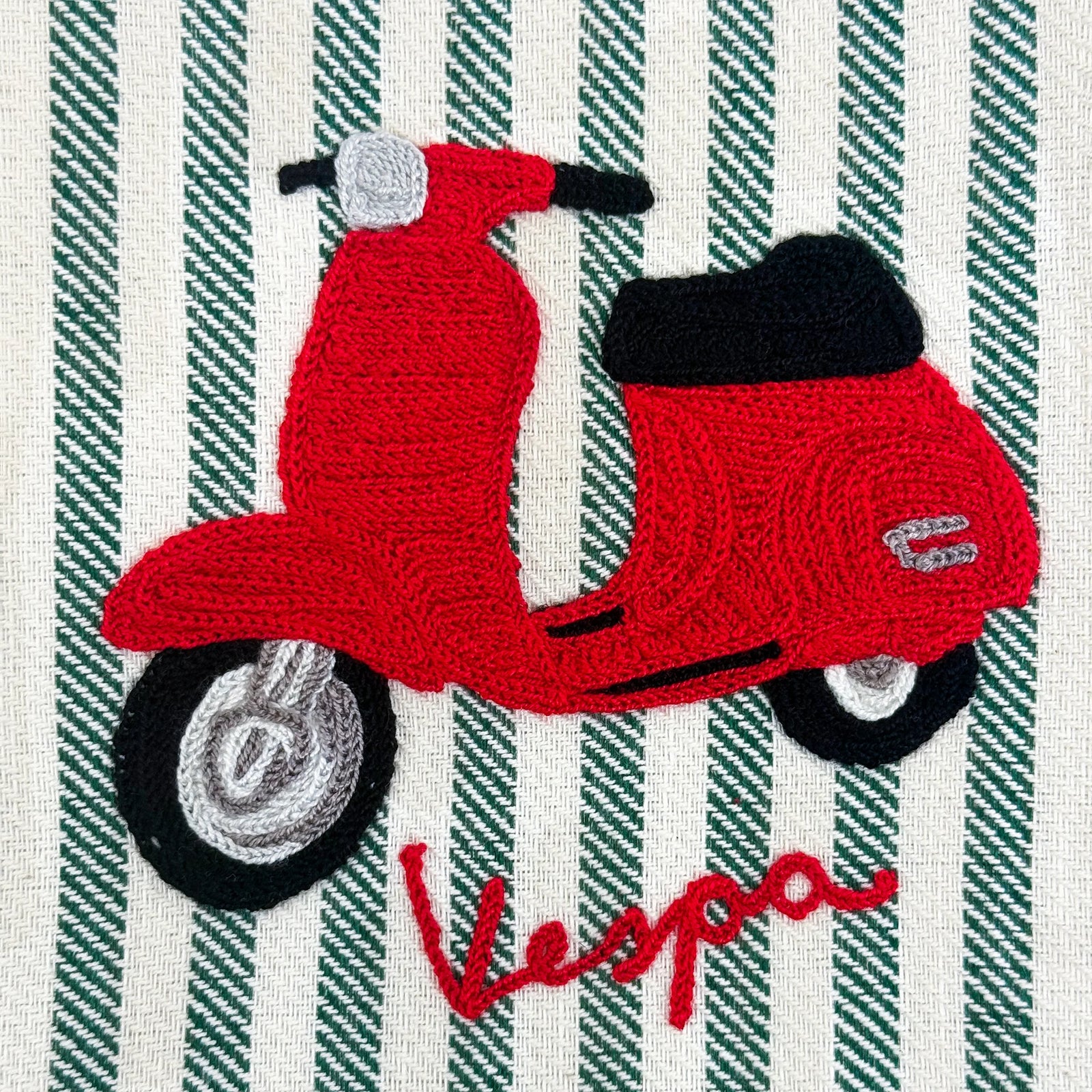 Busatti Vespa embroidered kitchen towel in assorted colors, made in Italy, featuring detailed Vespa scooter design on soft fabric.