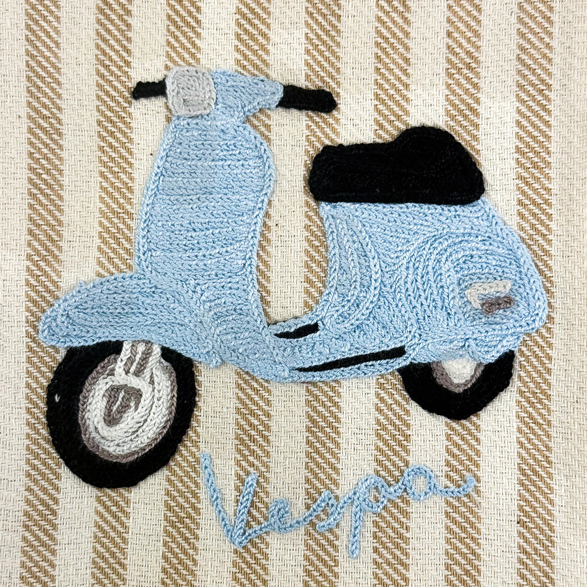 Busatti Vespa embroidered kitchen towel in assorted colors, made in Italy, featuring detailed Vespa scooter design on soft fabric.
