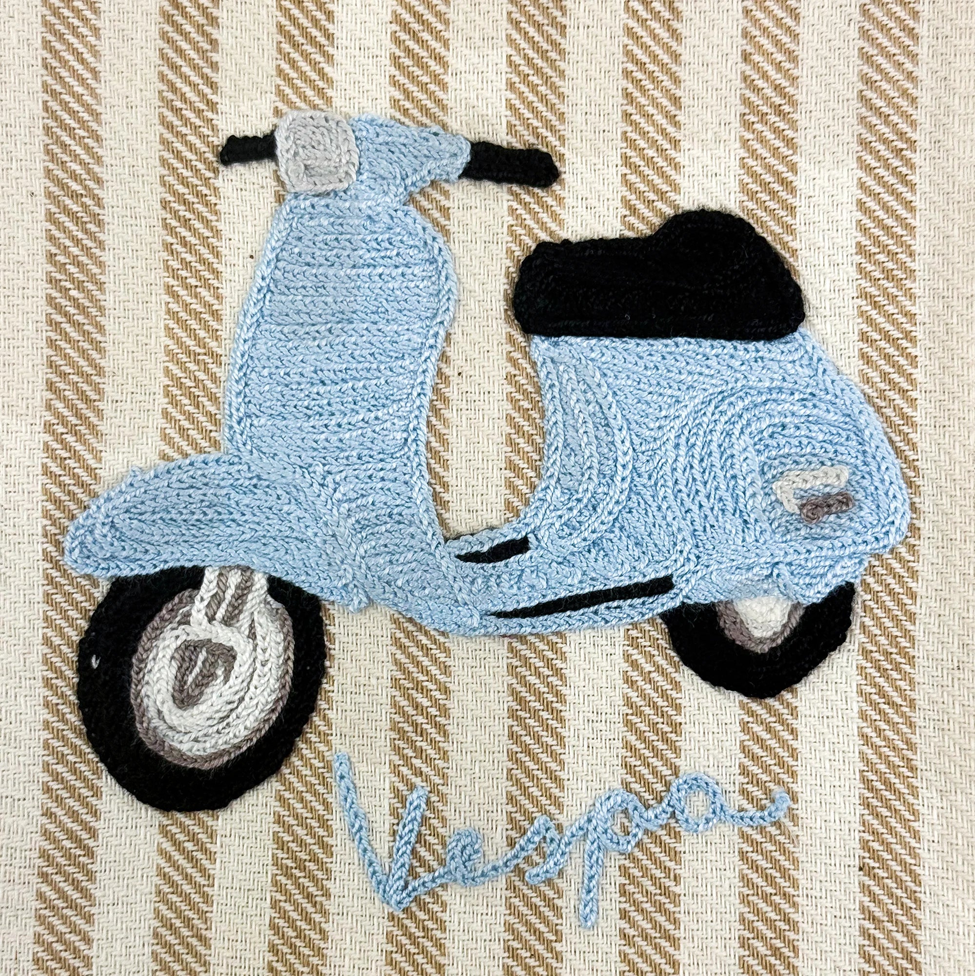 Busatti Vespa embroidered kitchen towel in assorted colors, made in Italy, featuring detailed Vespa scooter design on soft fabric.