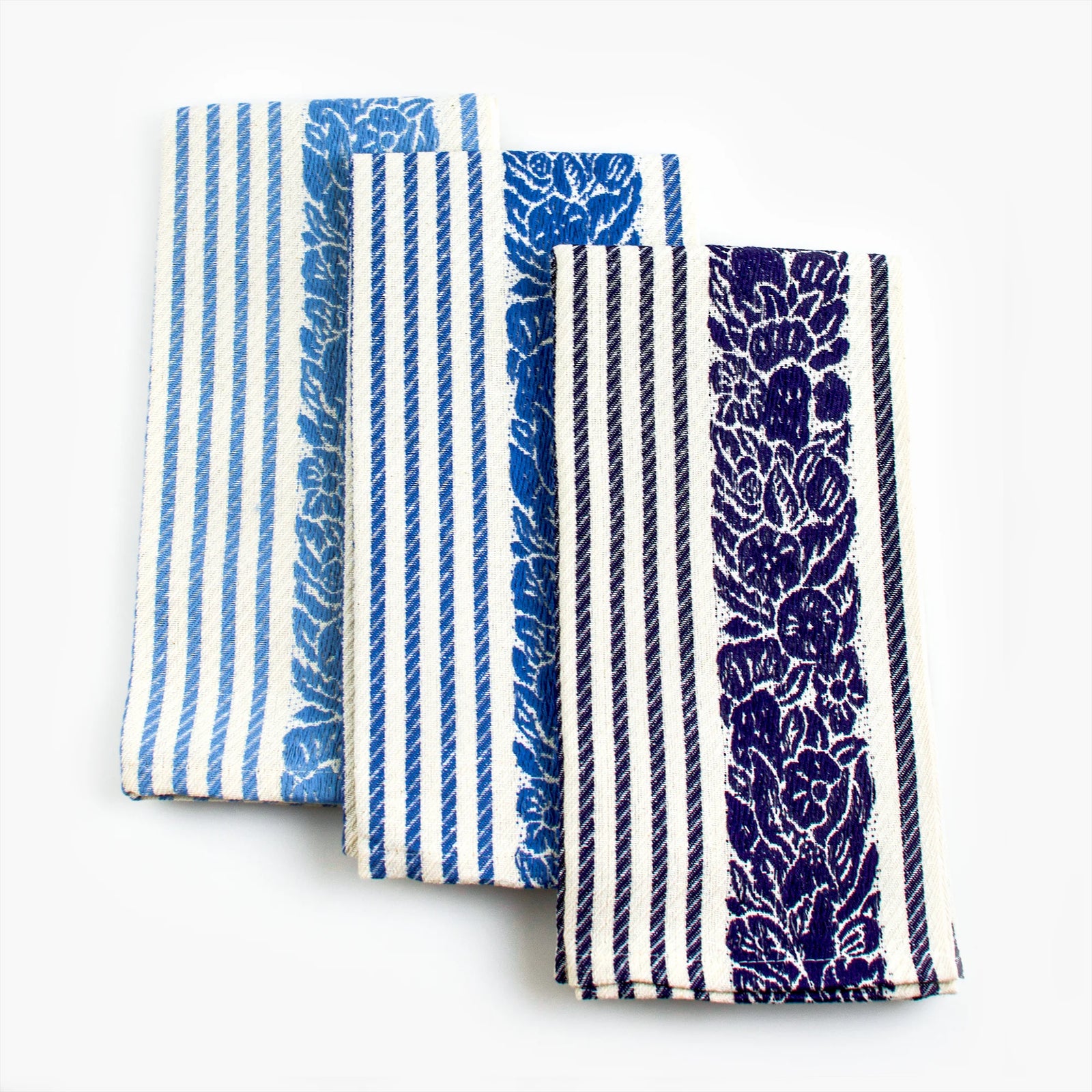Busatti floral and stripe kitchen towel in assorted colors, made in Italy, with vibrant floral and striped patterns on soft fabric.