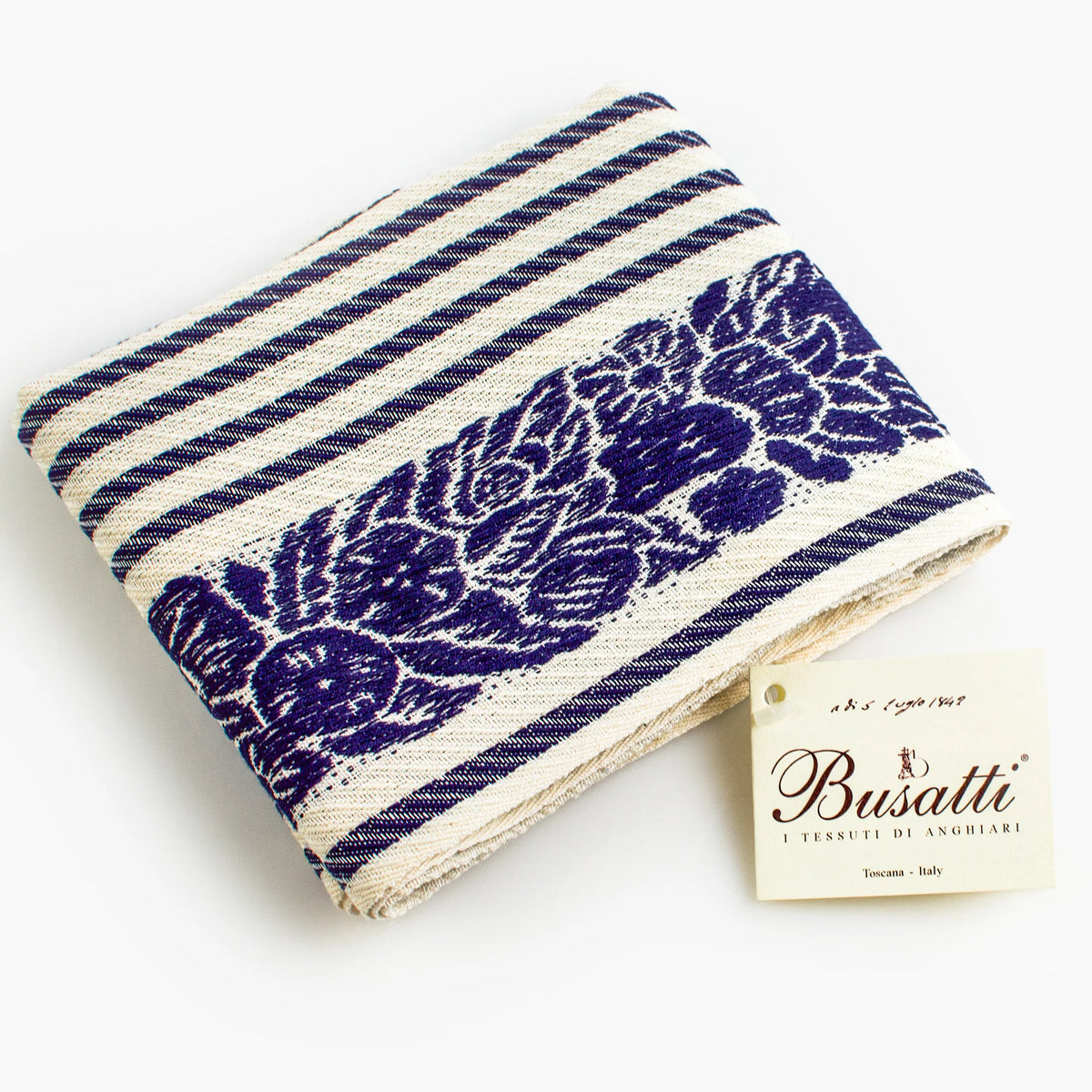 Busatti floral and stripe kitchen towel in assorted colors, made in Italy, showcasing elegant fabric with floral and stripe patterns.