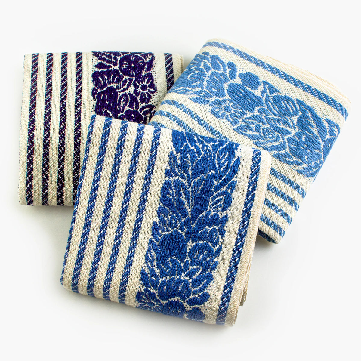 Busatti floral and stripe kitchen towel in assorted colors, made in Italy, featuring vibrant floral and striped patterns.