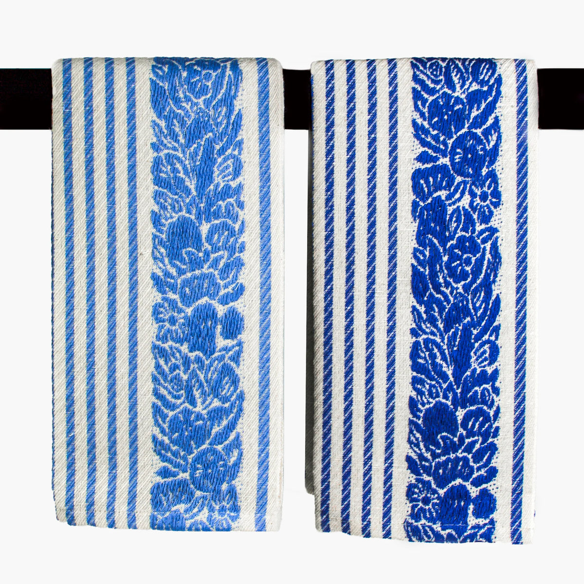 Busatti floral and stripe kitchen towel in assorted colors, made in Italy, displayed with vibrant patterns and soft fabric texture.