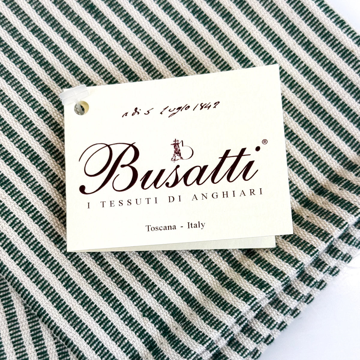 Busatti Stripe Kitchen Towel in assorted colors, made in Italy, featuring a woven striped pattern, ideal for kitchen use.