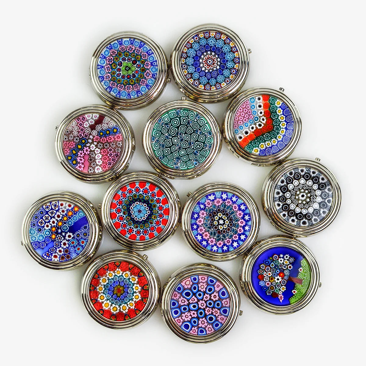 Colorful Millefiori handmade pillboxes by My Italian Decor, showcasing intricate glass floral designs in various vibrant colors.