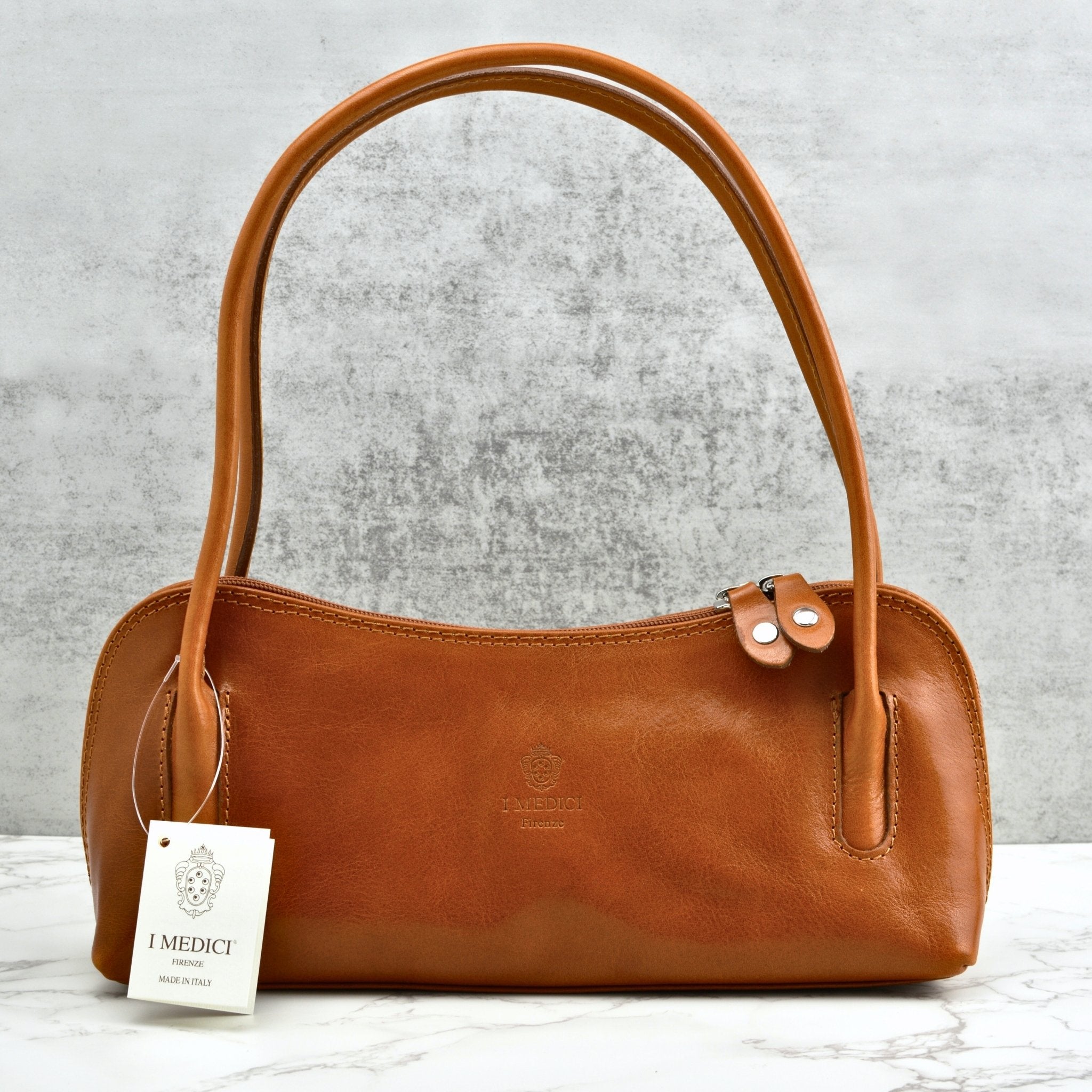 Brown Carina Shoulder Bag by MyItalianDecor made of Italian leather, showcasing a stylish handbag with elegant design details.