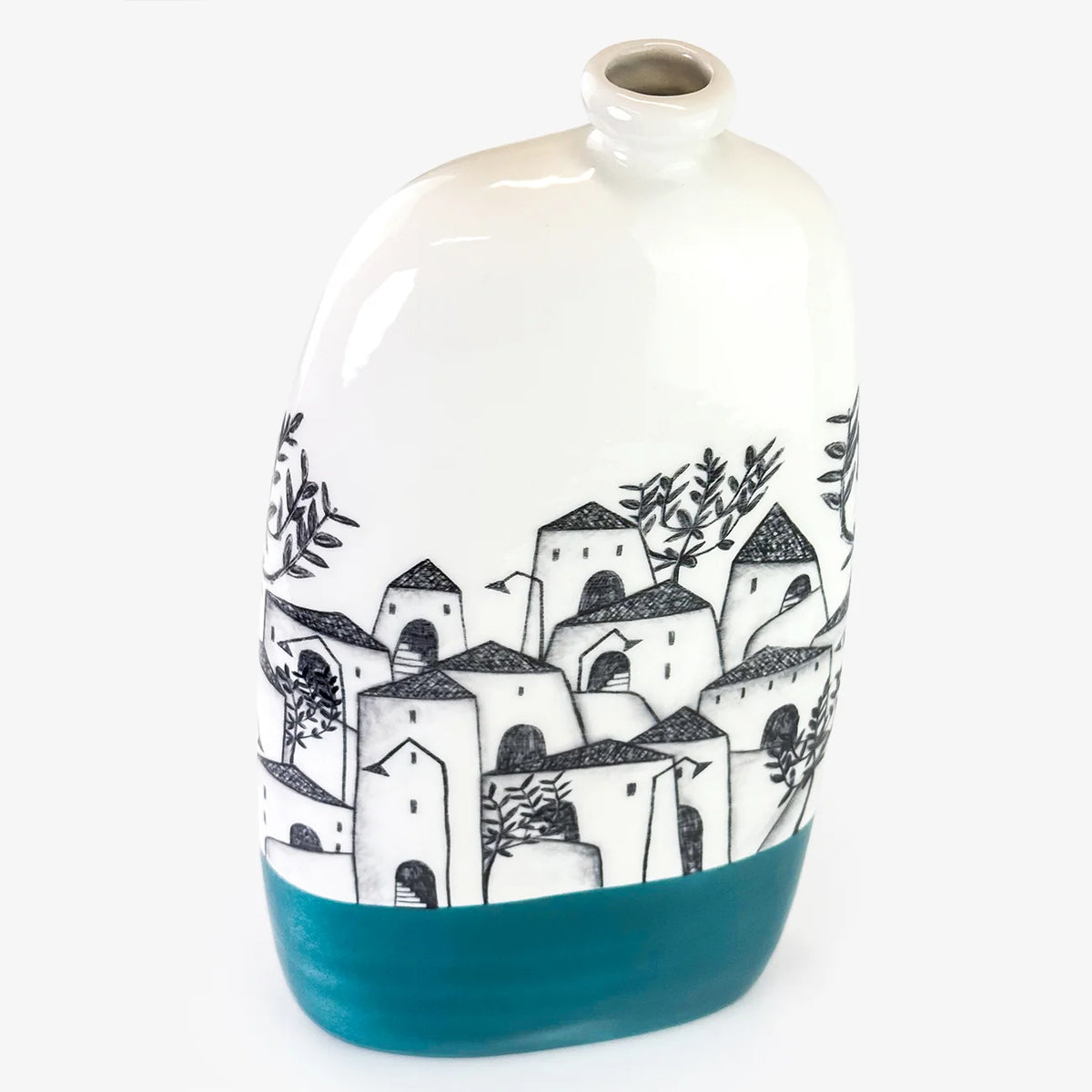 A ceramic bottle vase with a glossy white upper body, a black hand-drawn illustration of Mediterranean houses and trees, and a solid teal blue lower section, set against a plain white background.