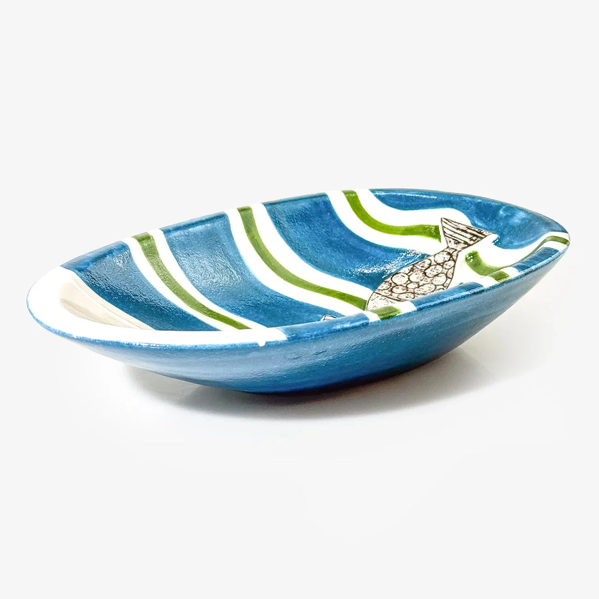 A ceramic decorative bowl with a blue exterior, white and green stripes inside, and a hand-painted mermaid design on the side, set against a plain white background.