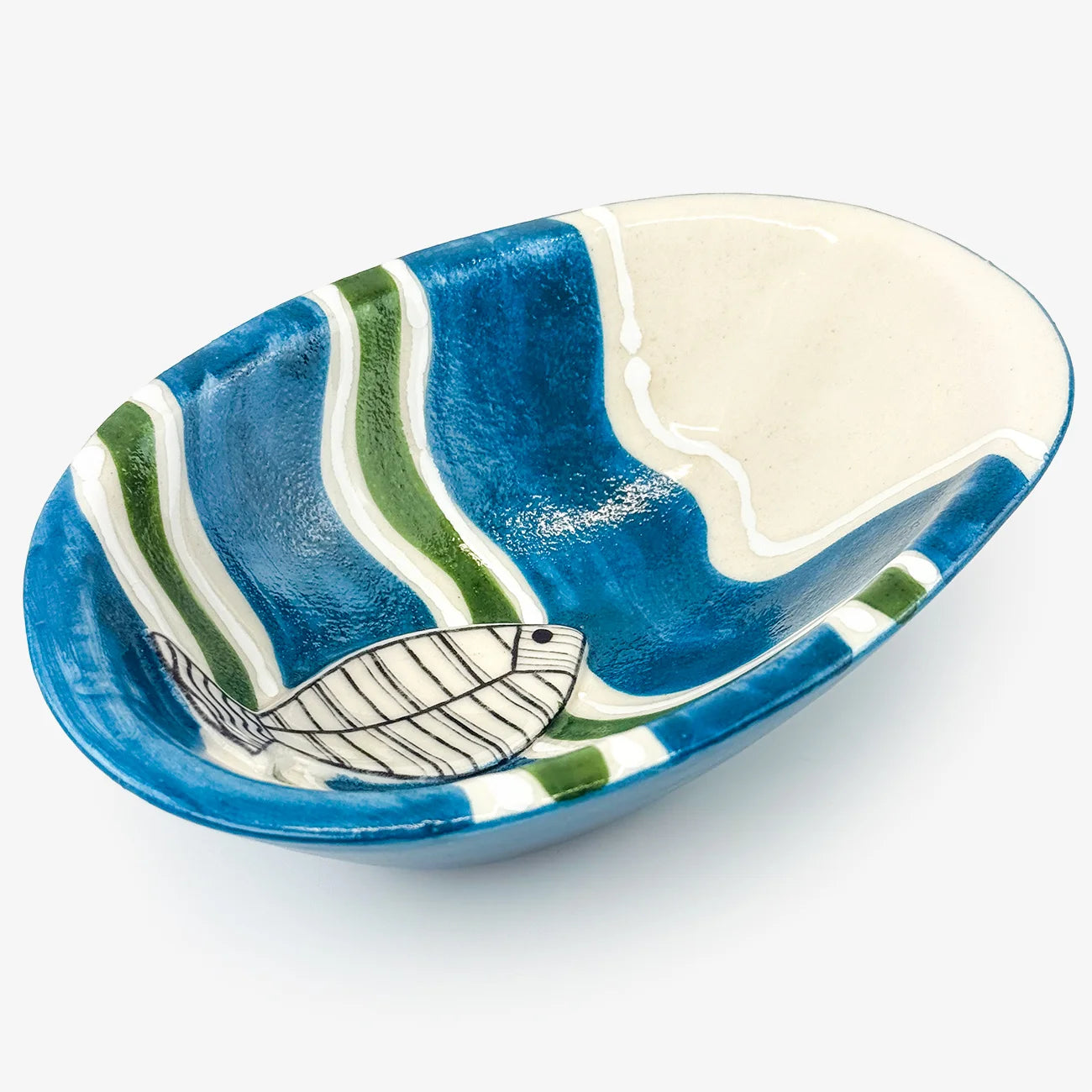 A set of ceramic serving platters with a blue and green wavy pattern and white fish illustrations, shown on a clean white background.