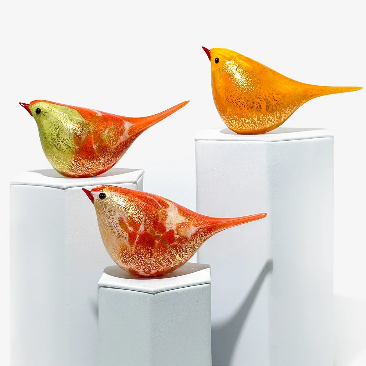 Colorful Murano glass orange Chirpie bird figurine by Nico, showcasing intricate craftsmanship and vibrant glass details.