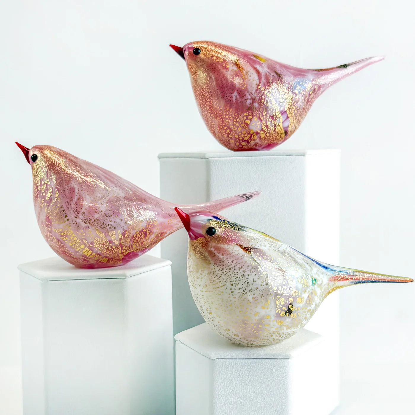 Pink Murano glass Chirpie bird, handblown Italian artisan decor, showcasing vibrant color and intricate craftsmanship.