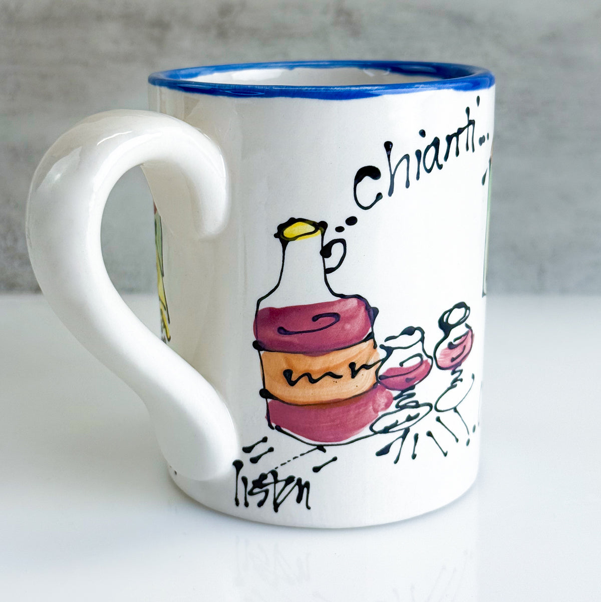 White mug with colorful wine-themed design and 'Chianti' text on a gray background