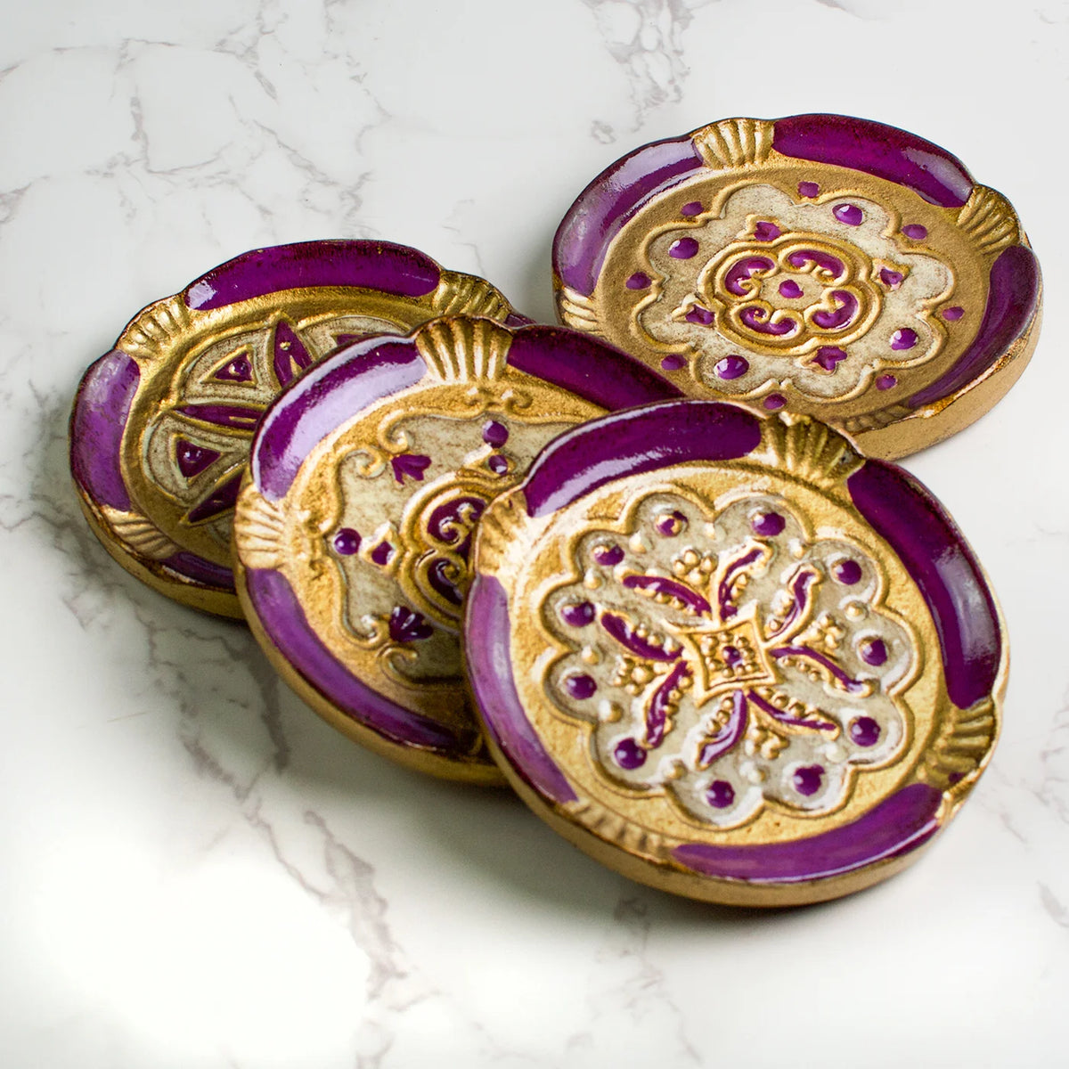 Set of Florentine wood coasters from My Italian Decor featuring intricate decorative trays with traditional Italian design.