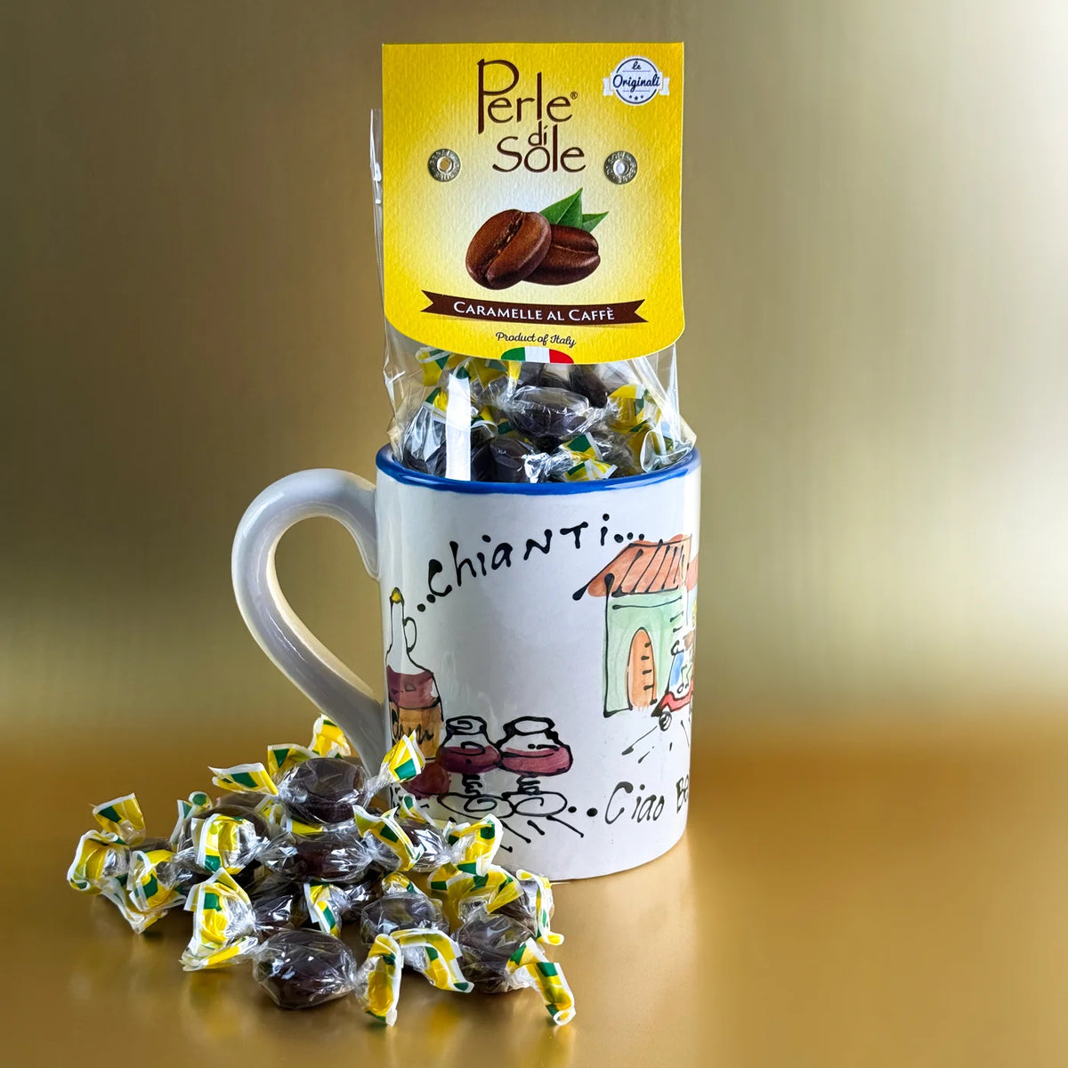 Ceramic mug with "La Dolce Vita" design from My Italian Decor, filled with hard coffee candies on a white background.