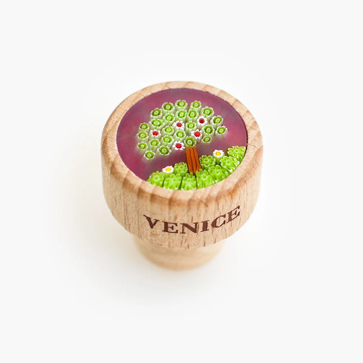 Murano glass wine stopper with a tree design, made in Italy, from MyItalianDecor, showcasing intricate craftsmanship and vibrant glasswork.