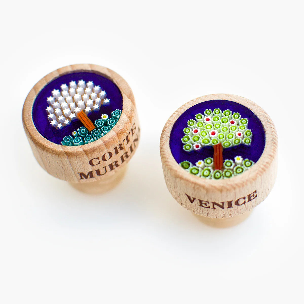 Murano glass wood wine stopper with tree design, made in Italy, for sealing bottles and preserving wine freshness.