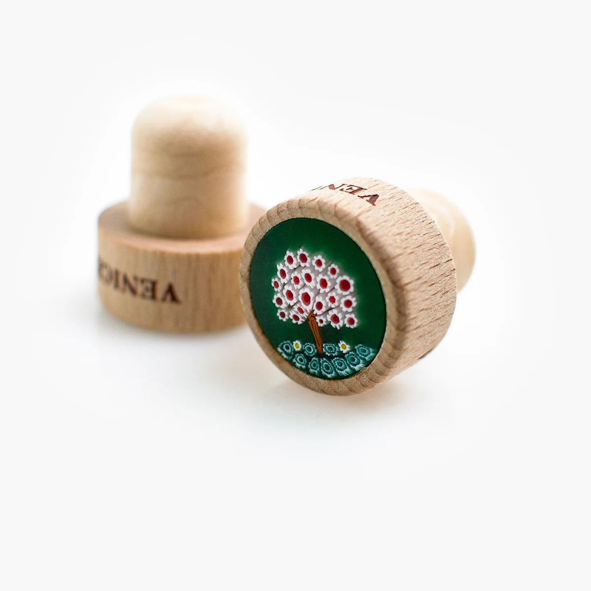 Murano glass wood wine stopper with tree design, made in Italy, for sealing bottles and preserving wine freshness.