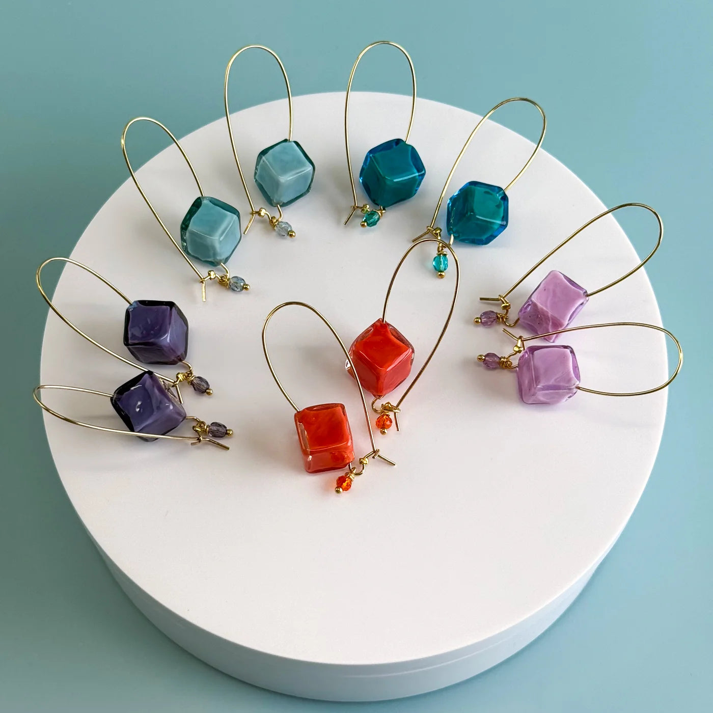 Gold Murano Glass Dolce earrings handcrafted in Italy, featuring cube-shaped design and elegant craftsmanship.