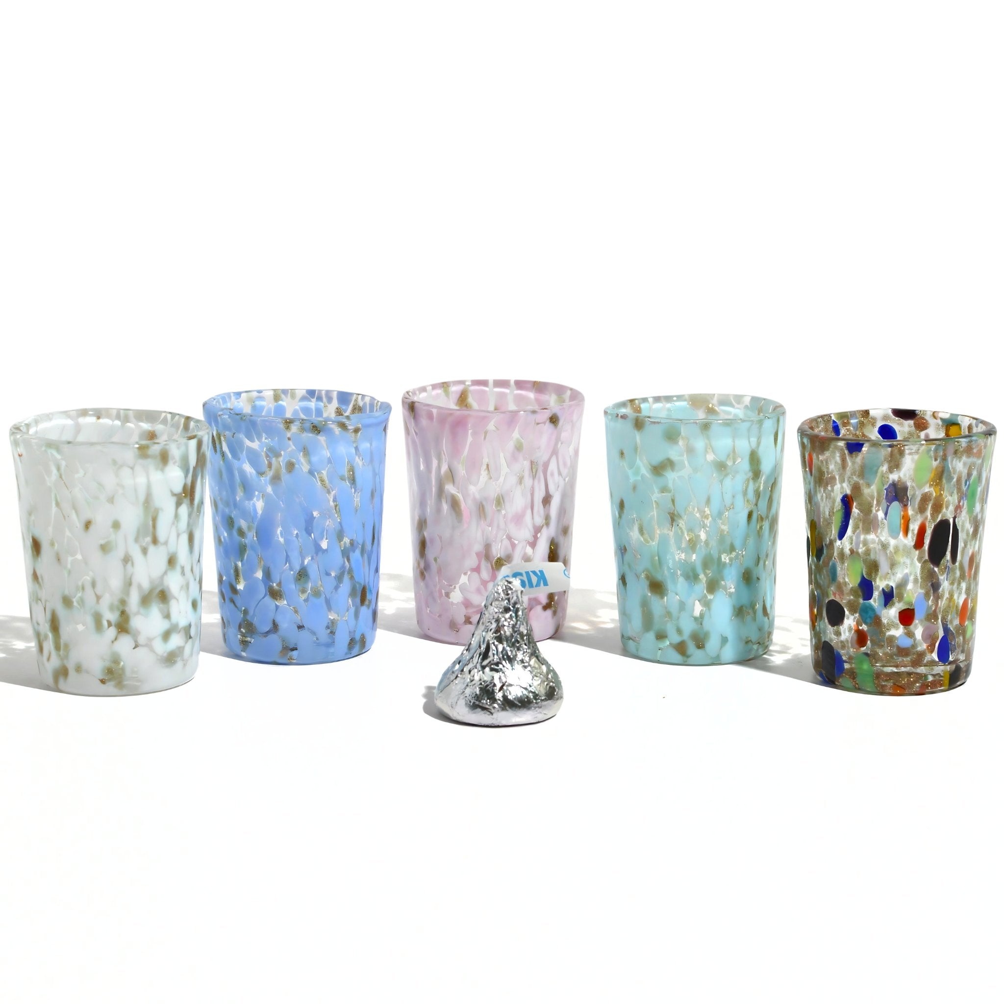 Colorful Murano Glass Tesoro shot glasses made in Italy, featuring vibrant designs and a smooth, rounded shape by MyItalianDecor.