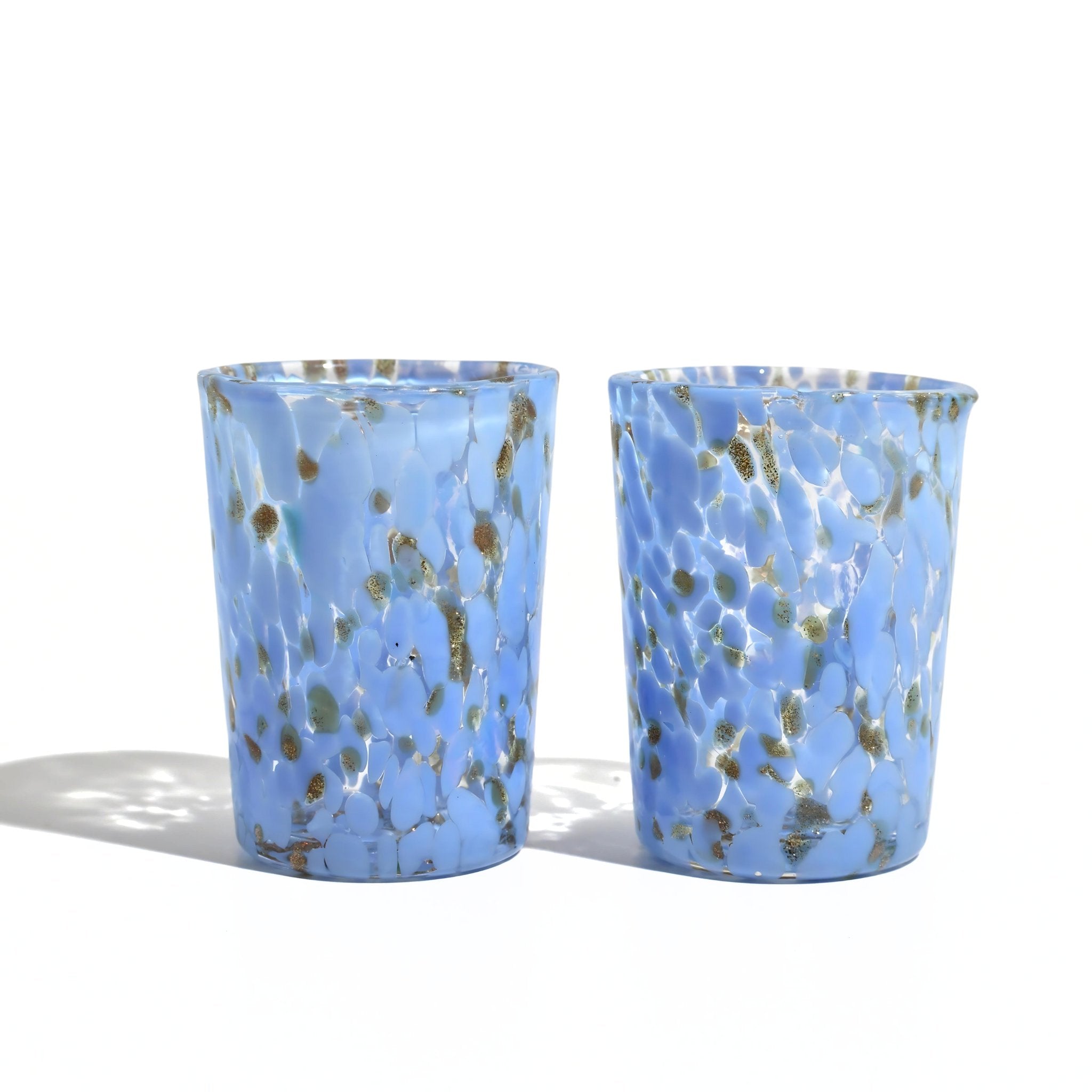 Set of two sky blue Murano glass Tesoro shot glasses made in Italy, handcrafted with intricate details by MyItalianDecor.