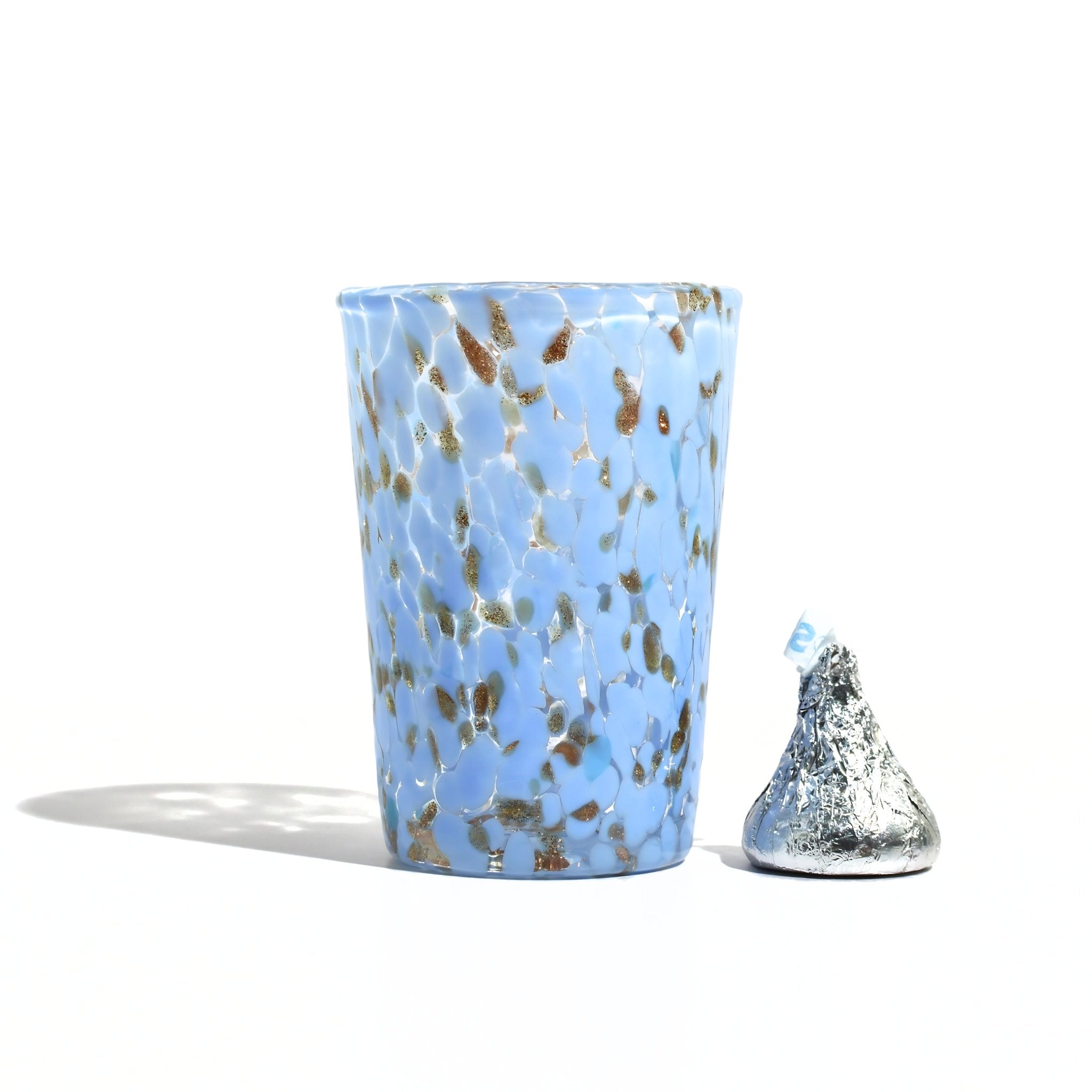 Sky blue Murano glass Tesoro shot glasses by MyItalianDecor, handcrafted Italian shot glasses with vibrant color and intricate design.