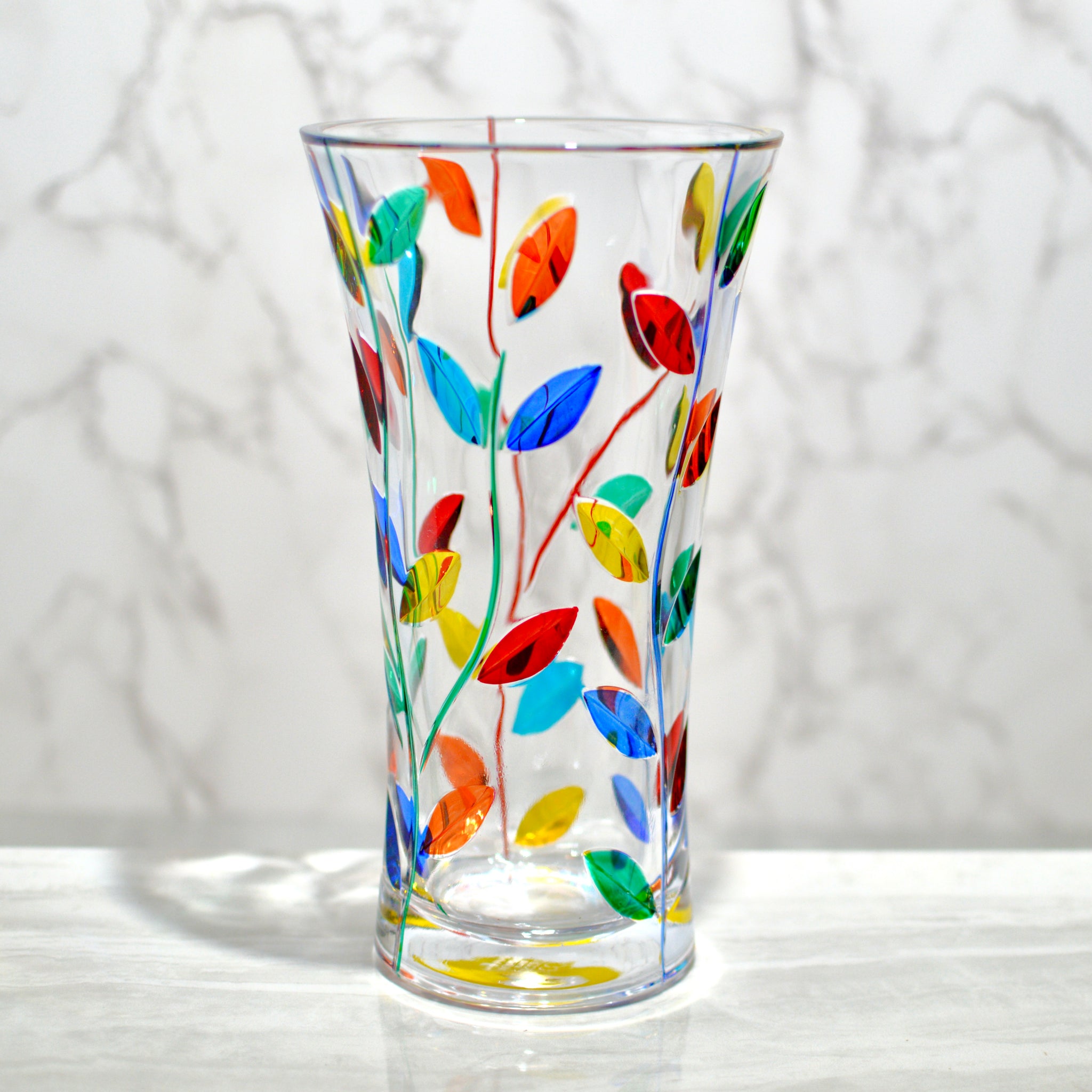 Small hand-painted Italian crystal Tree of Life vase, 8.5 inches tall, featuring intricate floral details in a decorative vase.