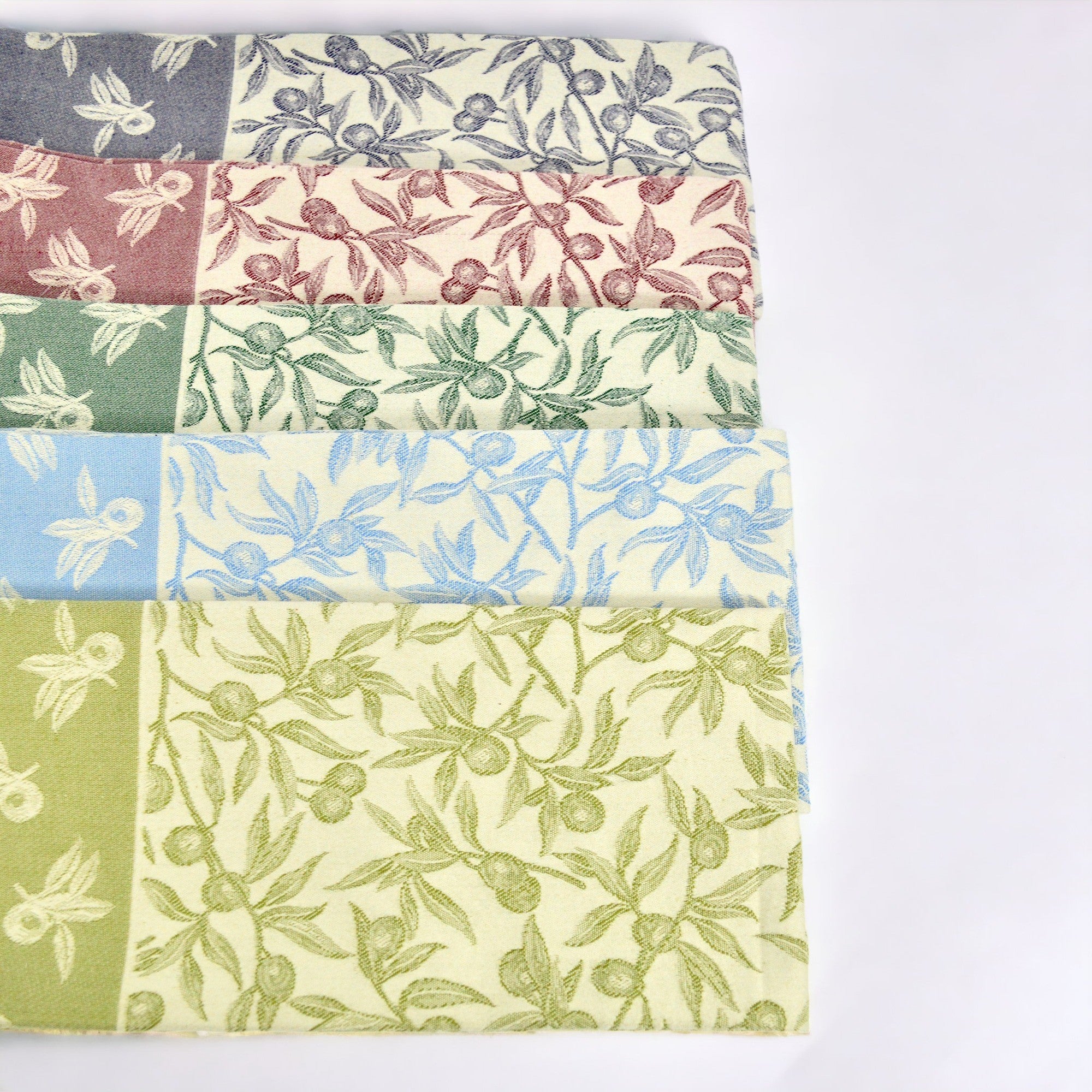 Busatti Oliva kitchen towel in assorted colors, made in Italy, featuring woven fabric with a classic table linen design.