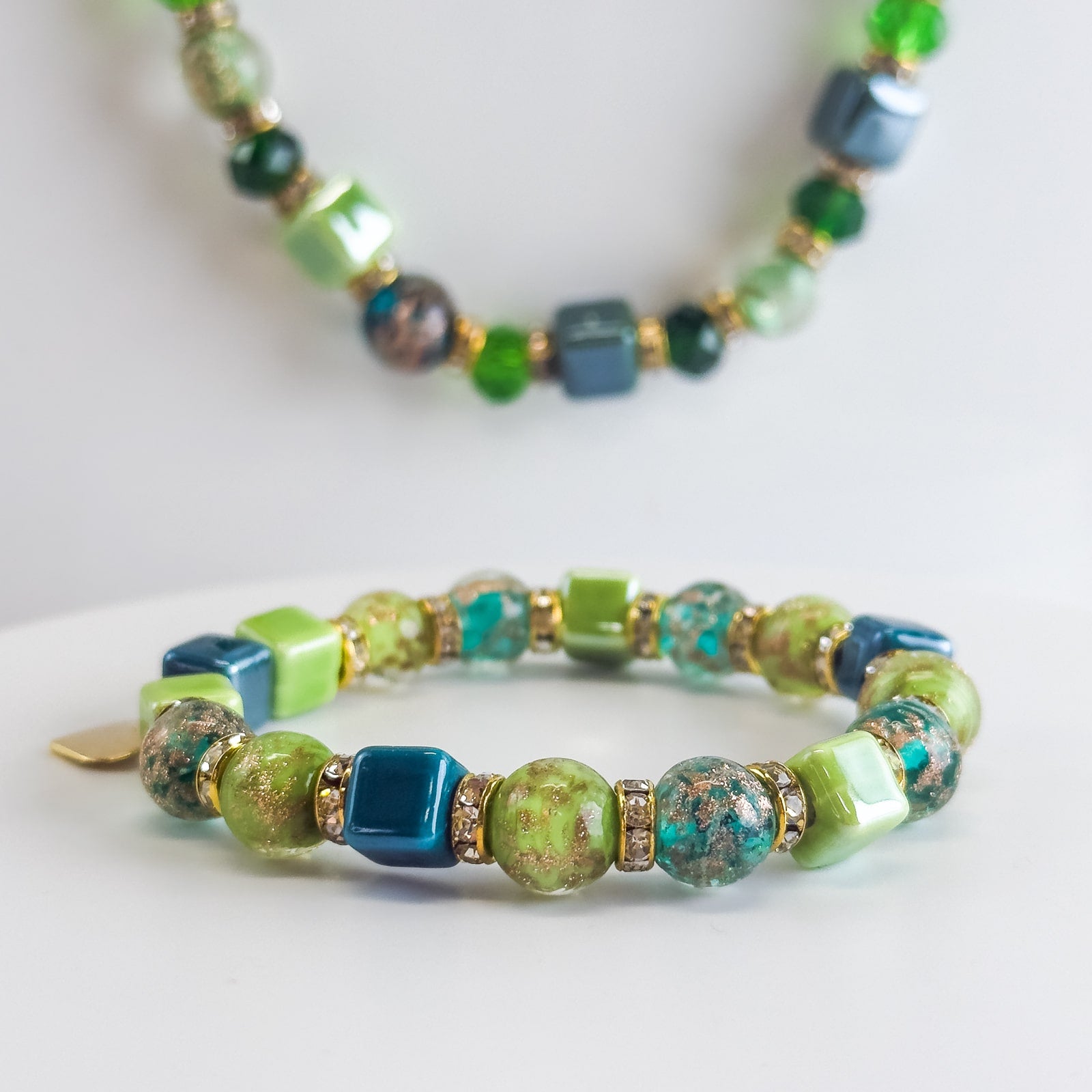 Green beaded jewelry set with matching necklace and bracelet by DZ, featuring stylish beaded jewelry from the Bellagio collection.