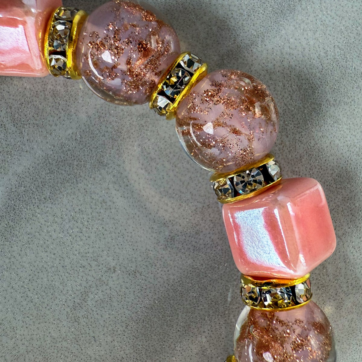 Pink beaded jewelry set including a necklace and bracelet from DZ's Bellagio collection, featuring elegant beaded design.