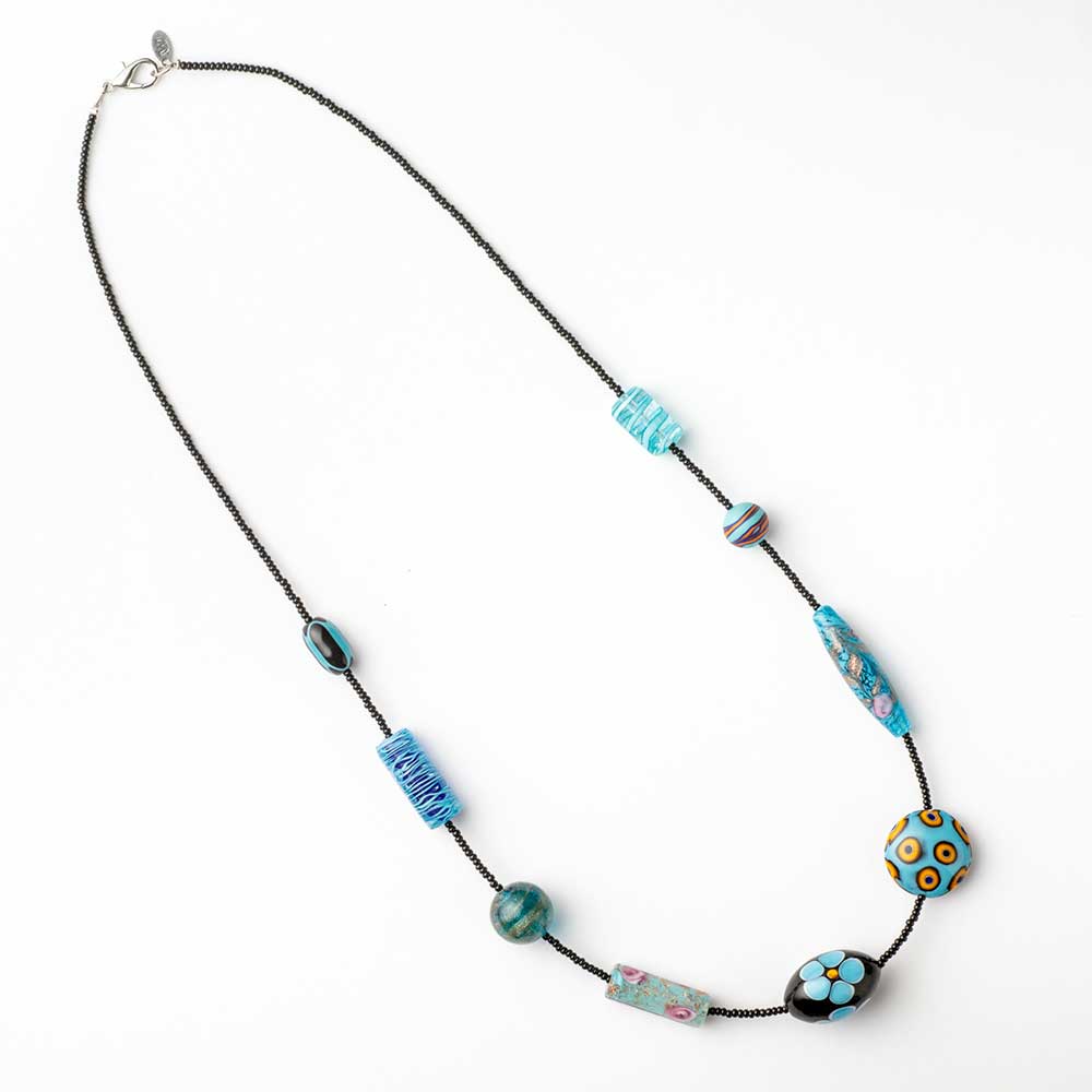 Blue Murano glass bead necklace from 9th Heaven collection by My Italian Decor, featuring handcrafted glass beads.
