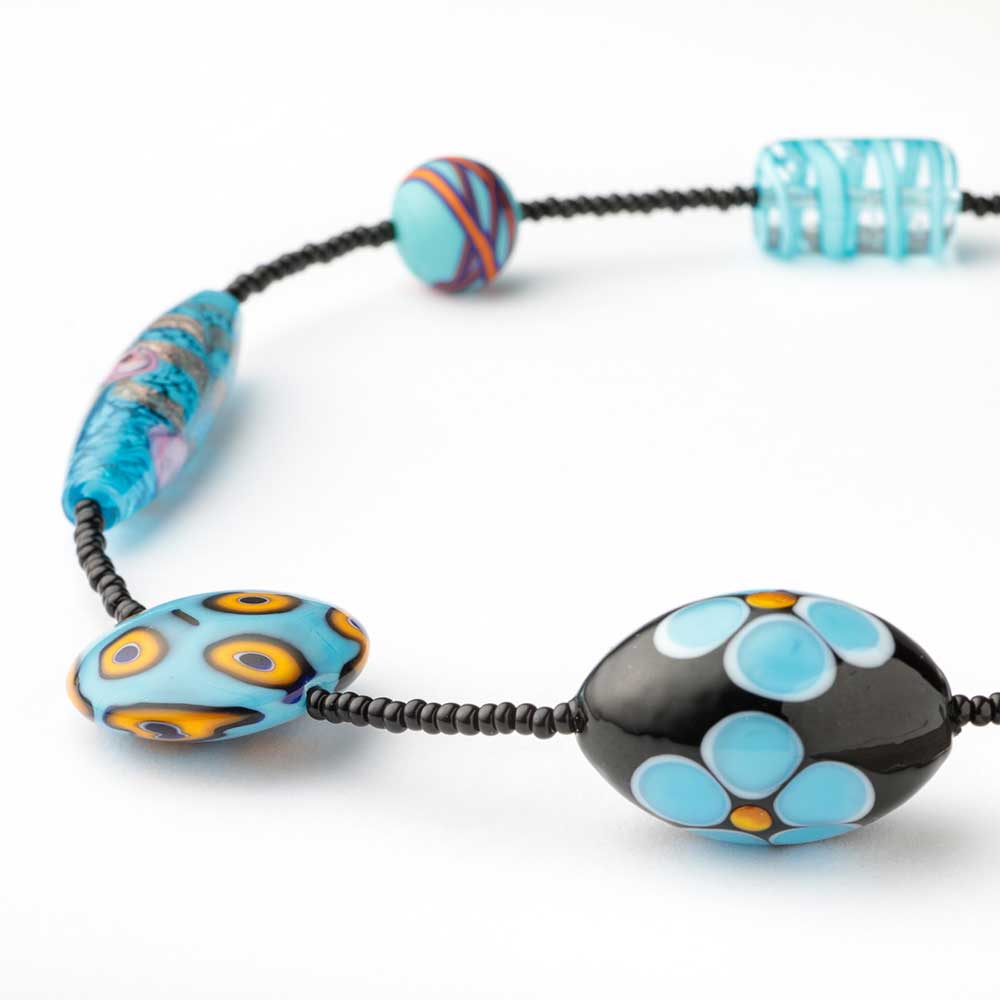 Colorful Murano glass bead necklace by My Italian Decor, featuring vibrant beads from the 9th Heaven collection.