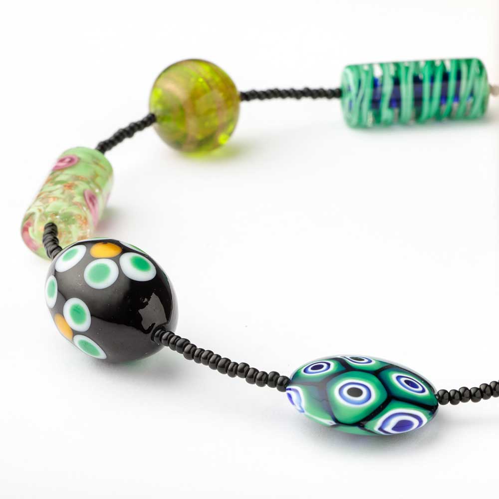 Murano glass bead necklace by My Italian Decor featuring vibrant green beads and elegant design.