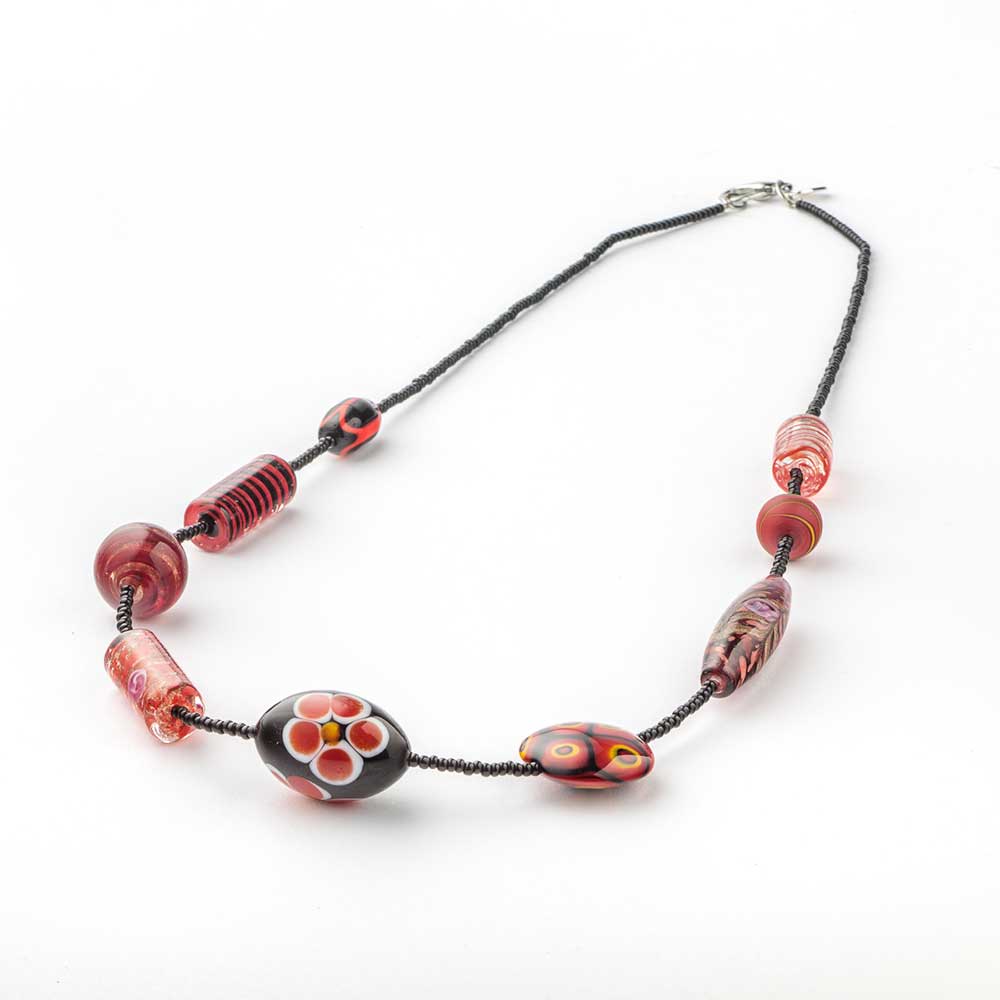 Red Murano glass bead necklace from 9th Heaven by My Italian Decor, featuring vibrant handcrafted glass beads on a delicate chain.