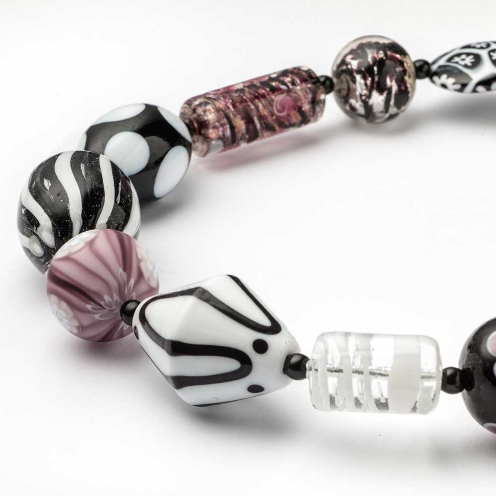 White, black, and pink Murano glass necklace with melting pot design by My Italian Decor, featuring vibrant, handcrafted jewelry.