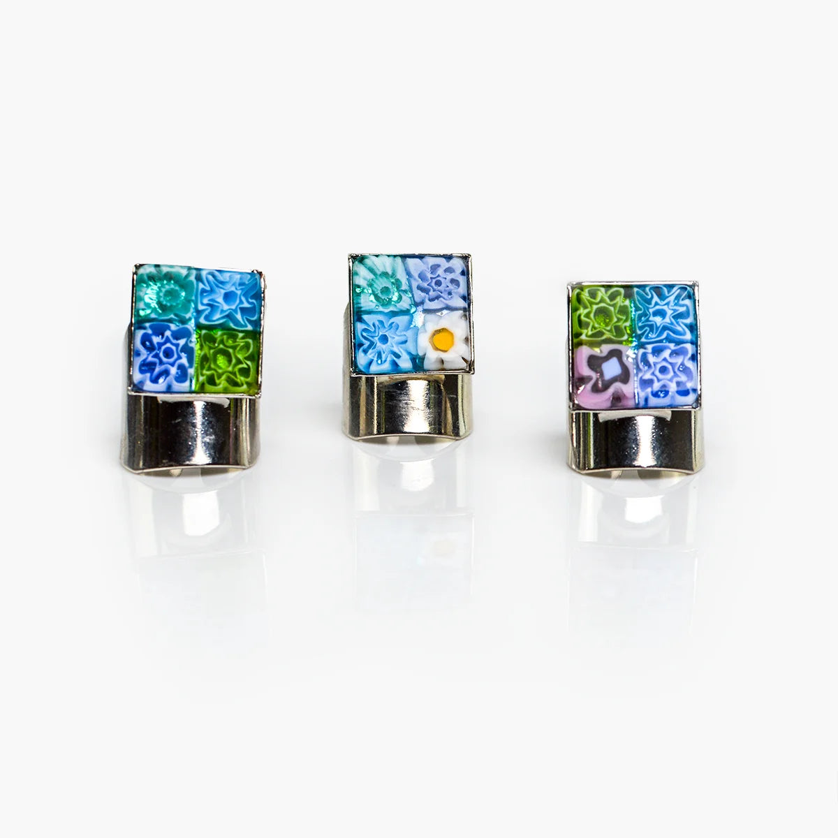 Colorful adjustable Millefiori Murano glass rings by My Italian Decor displayed on a white background.