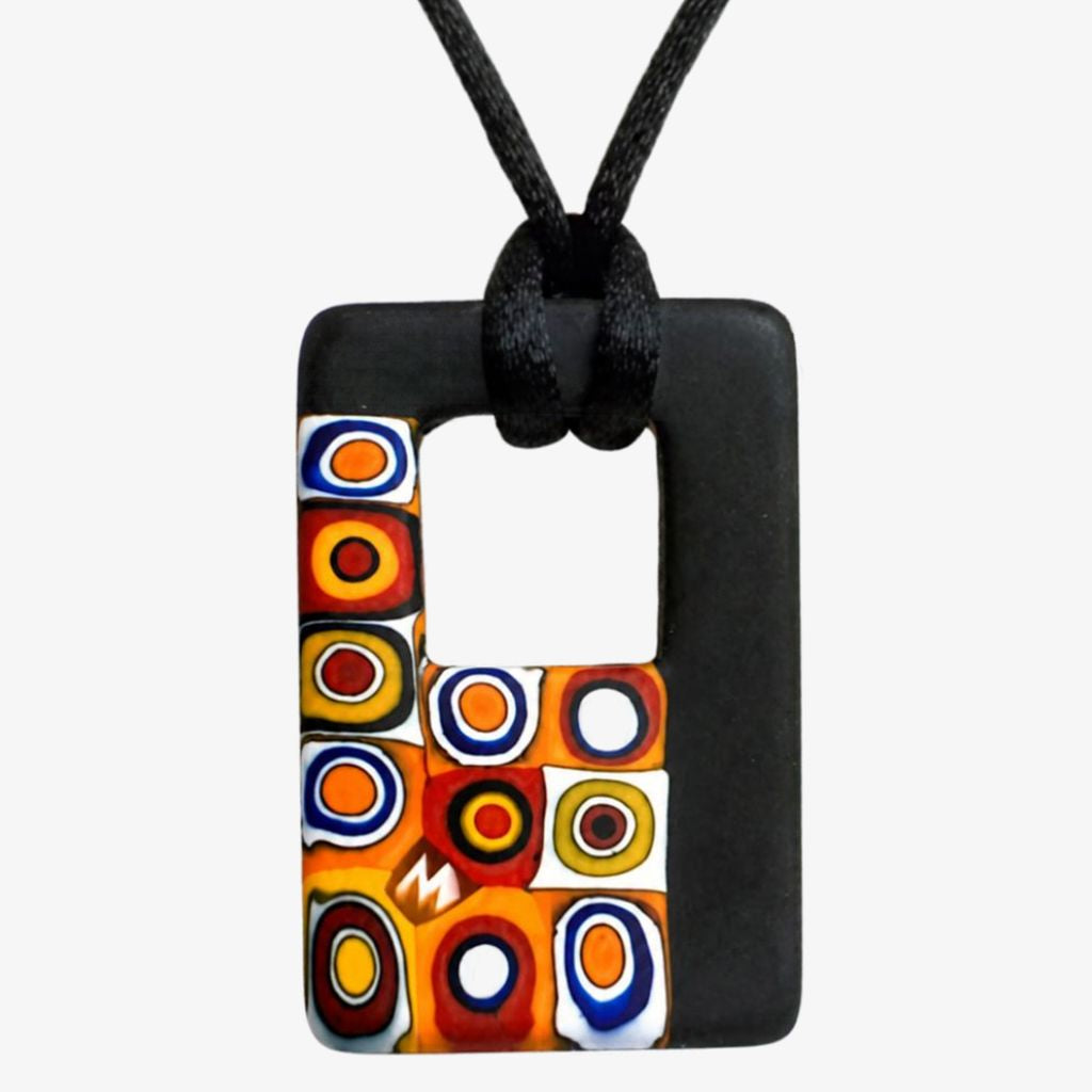 Rectangular black and Millefiori pendant featuring colorful circular patterns, designed by My Italian Decor, for charms and jewelry.