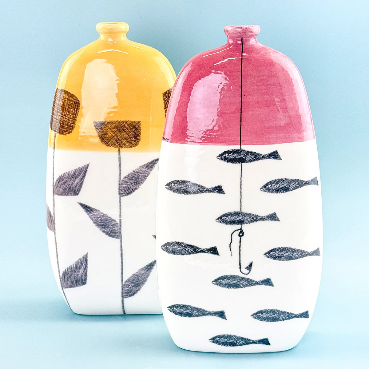 Hand-painted Fables ceramic bottle vases from My Italian Decor, featuring colorful designs, made in Naples for home and garden decor.