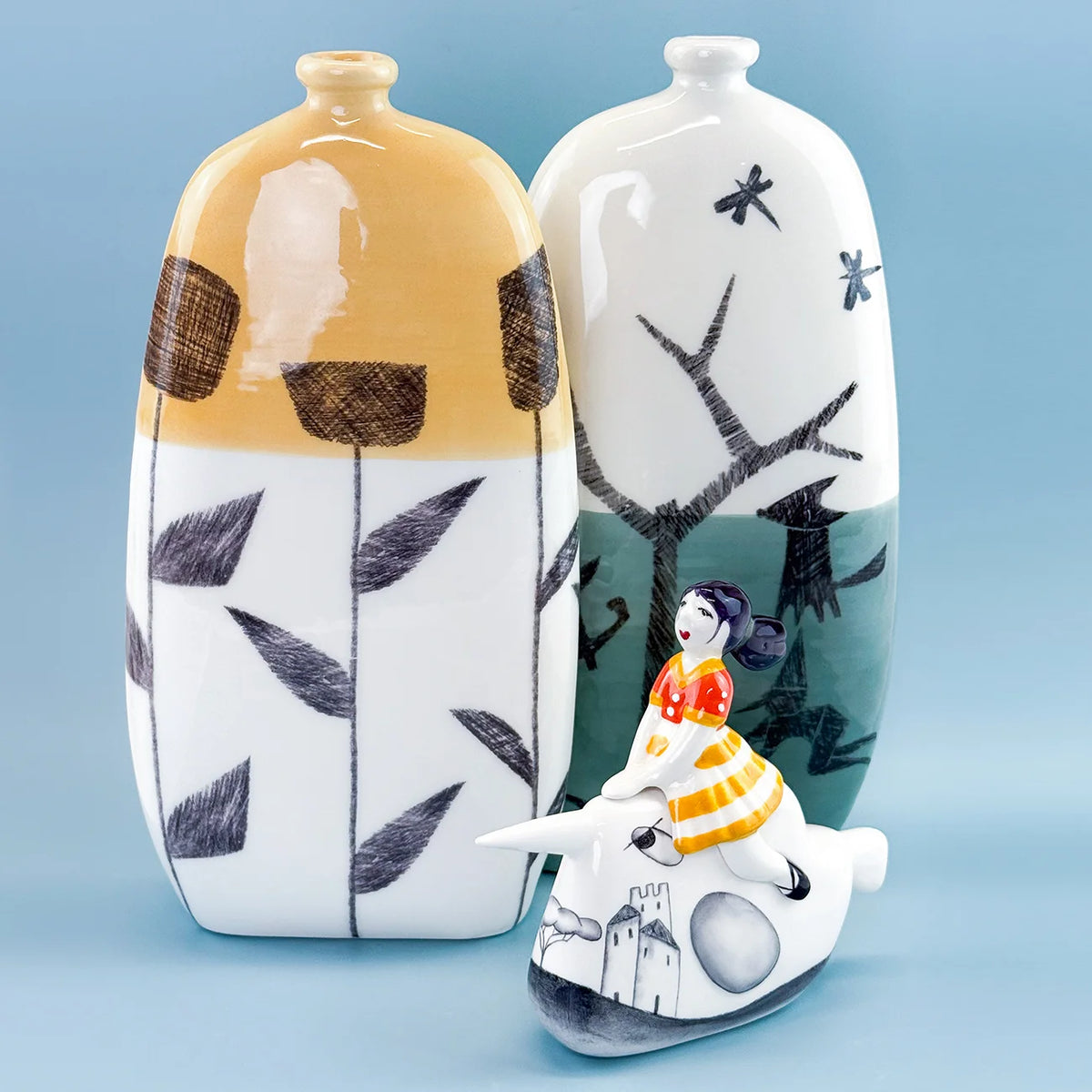 Hand-painted Fables ceramic bottle vases by My Italian Decor, crafted in Naples, featuring vibrant artwork and elegant shapes for home decor.