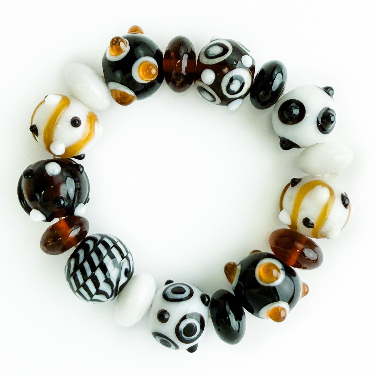 Black and white beaded bracelet and earrings set by My Italian Decor, featuring large beads and elegant design.