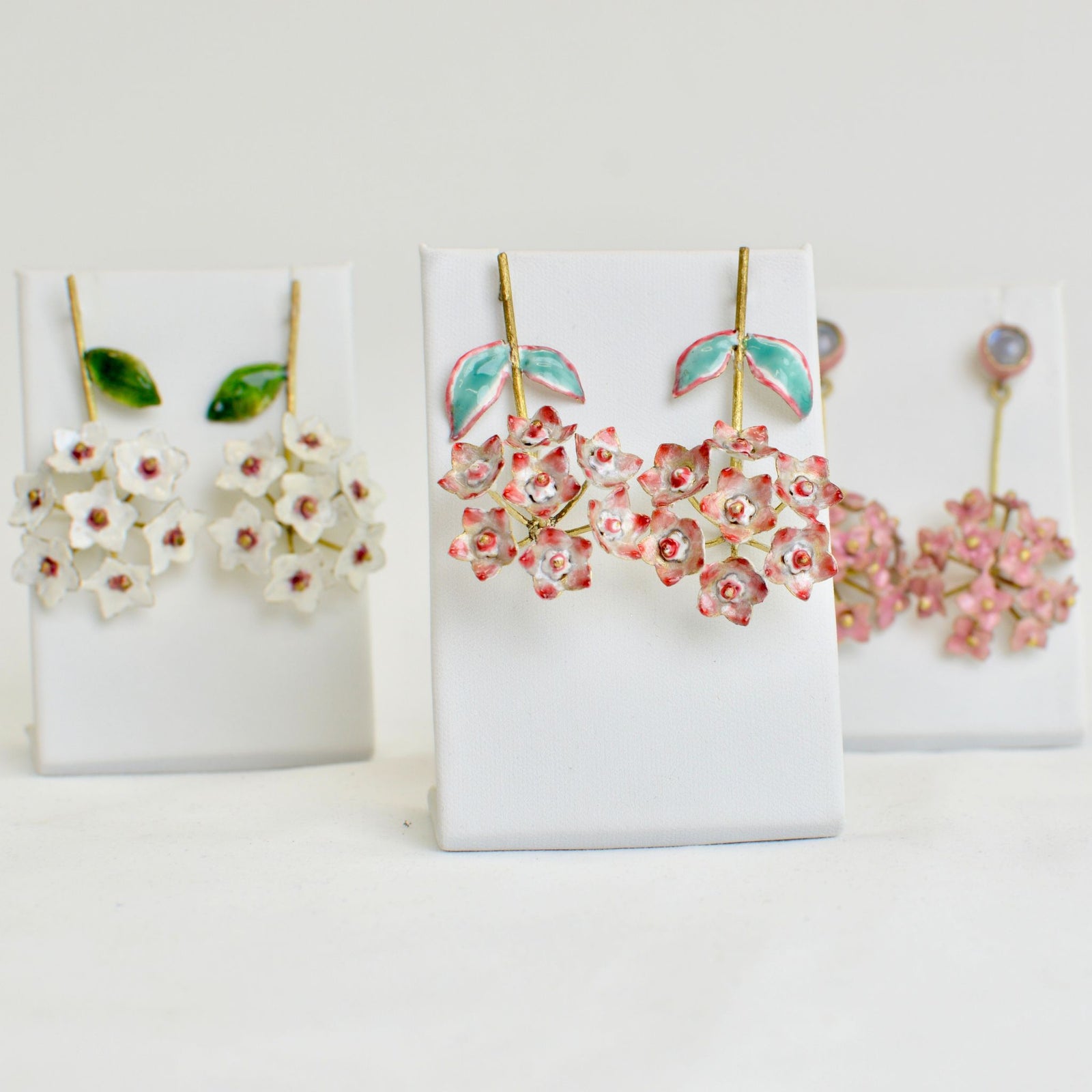 Pink hydrangea flower earrings from My Italian Decor's Giardino Collection, made in Italy, featuring delicate floral design.